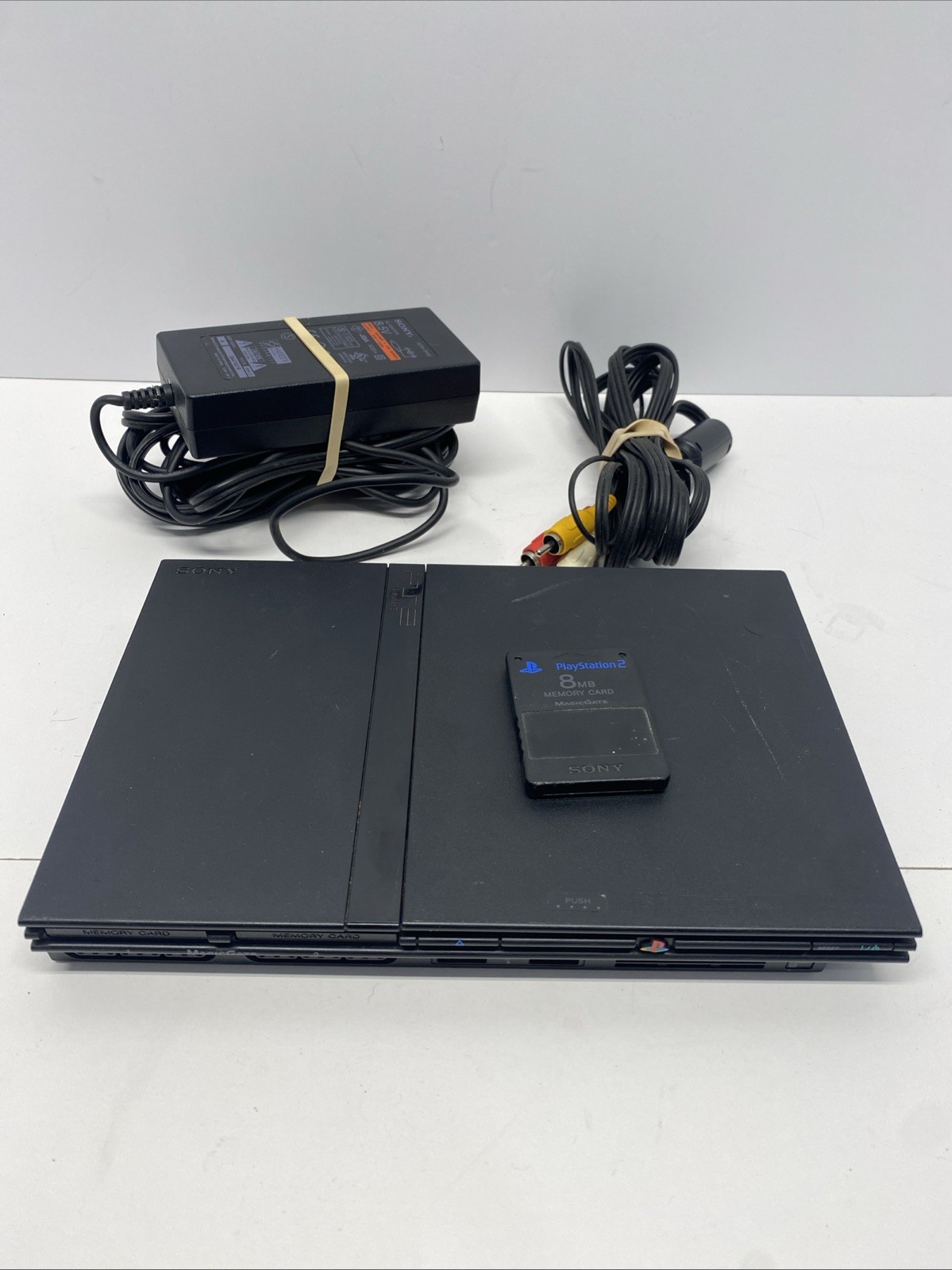 Sony PlayStation 2 Slim Console w/ Power Adapter, AV Cable- Black SCPH-70012