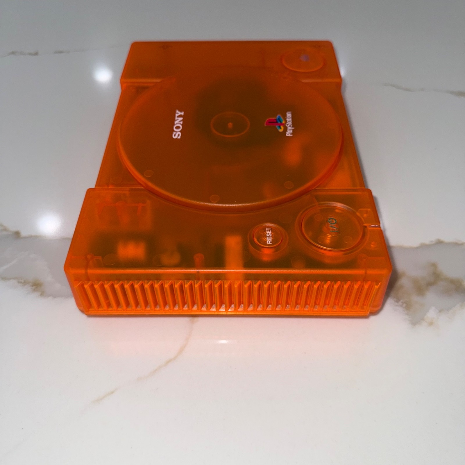 Sony PlayStation 1 Console (SCPH-5501) Bundle – Transparent Orange Clear Shell