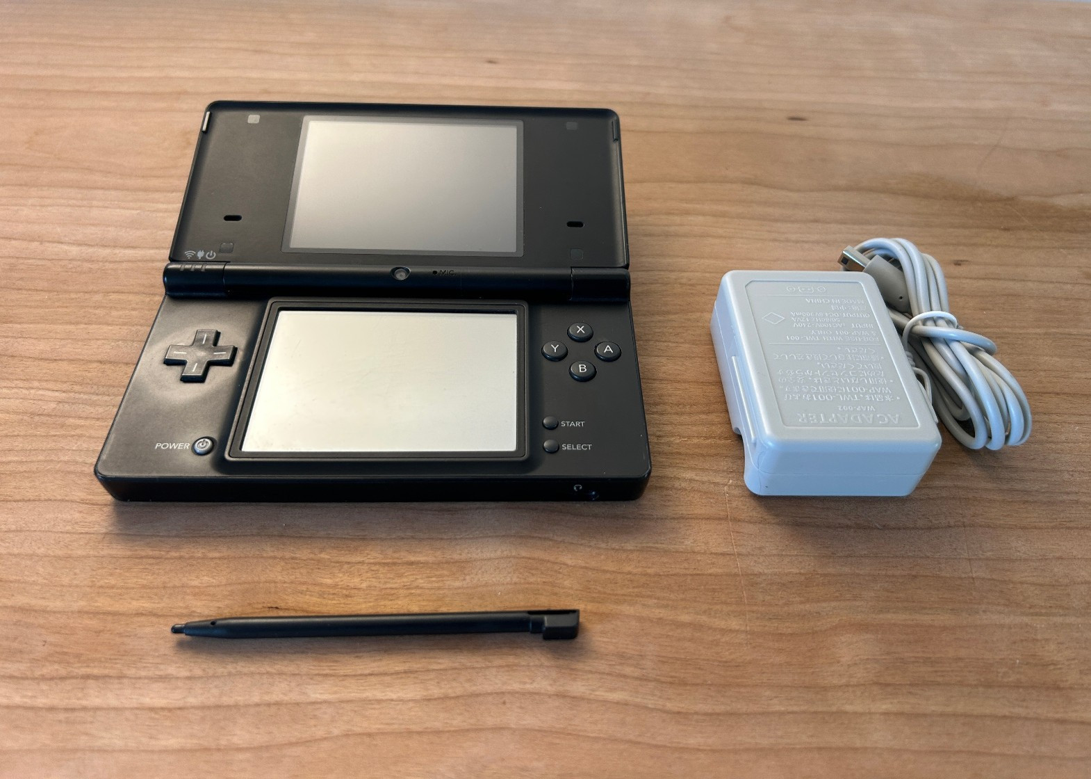 Nintendo DSi Black Handheld Console – Includes Stylus, Charger, New Battery
