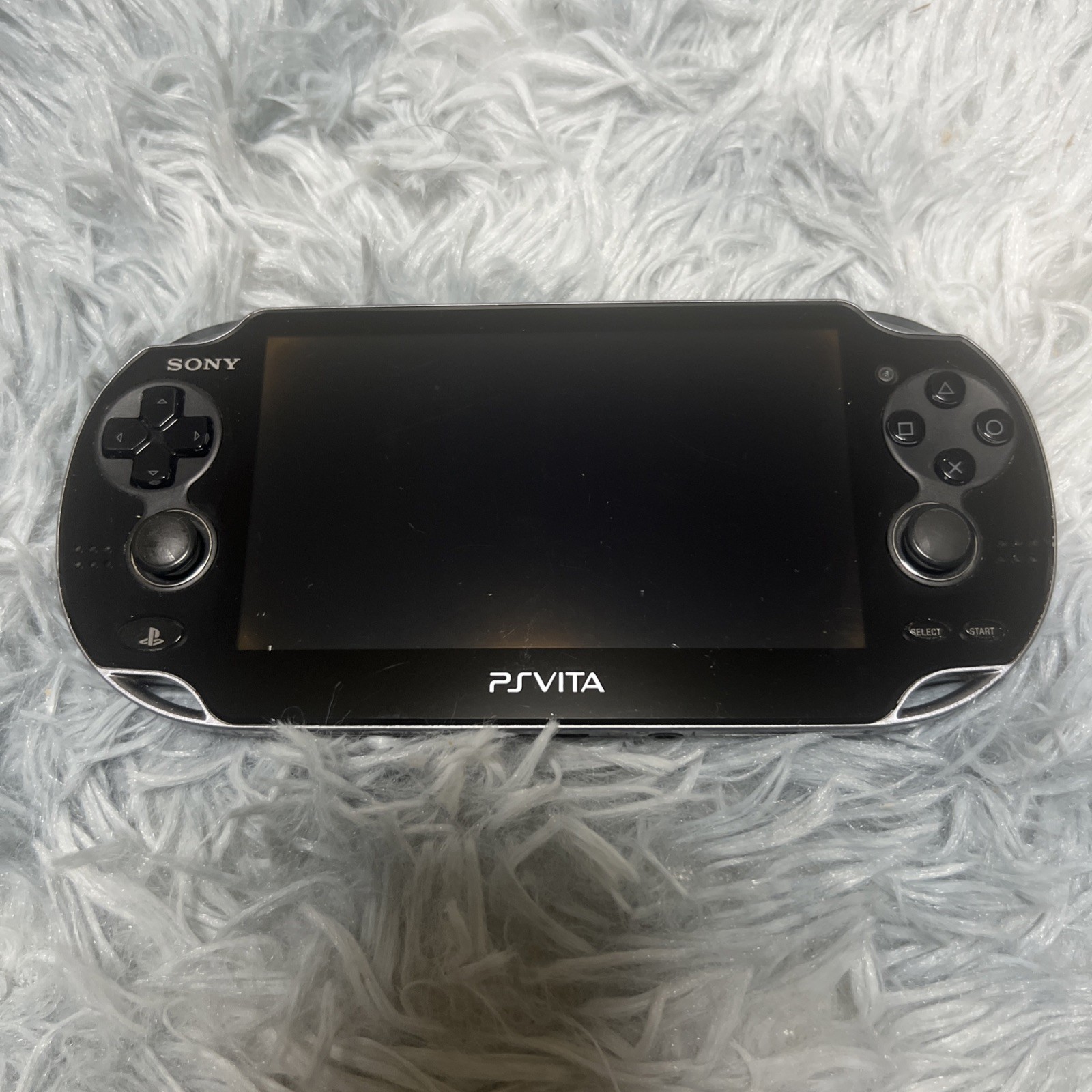 Sony PlayStation Vita Handheld System + 8GB memory card + 2 software & charger