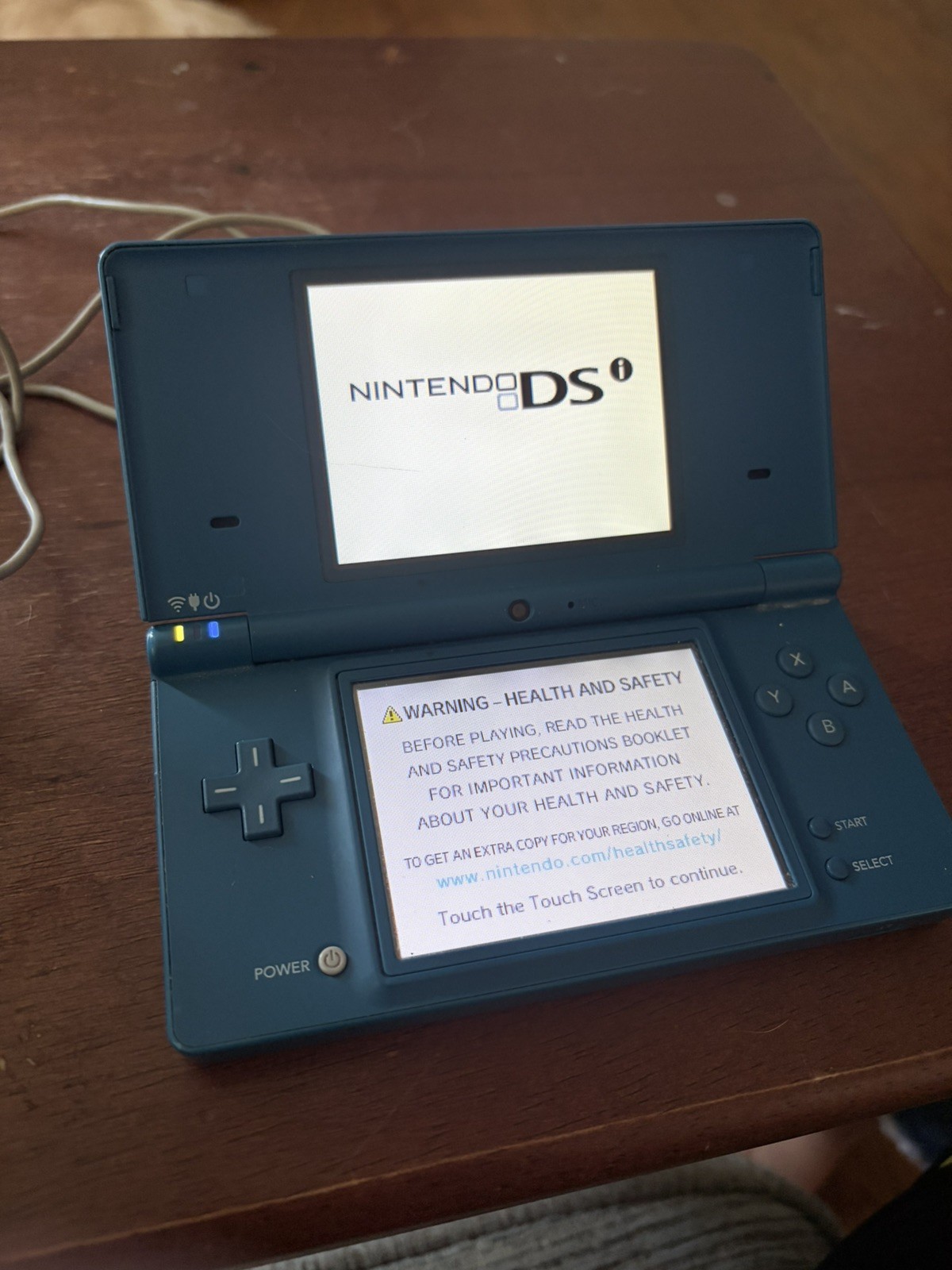 Nintendo DSi Blue Handheld System w charger – great condition. See photos.