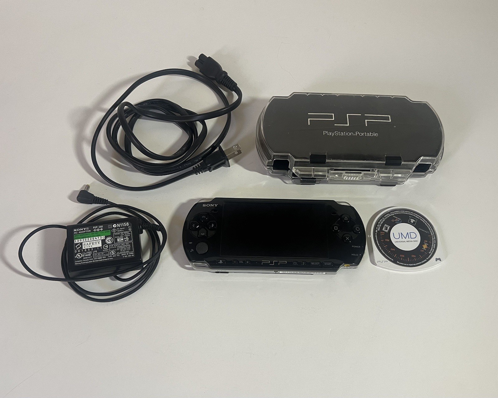 PSP-3001c With Hard Carry Case Original Cables & Gran Turismo – Missing Battery