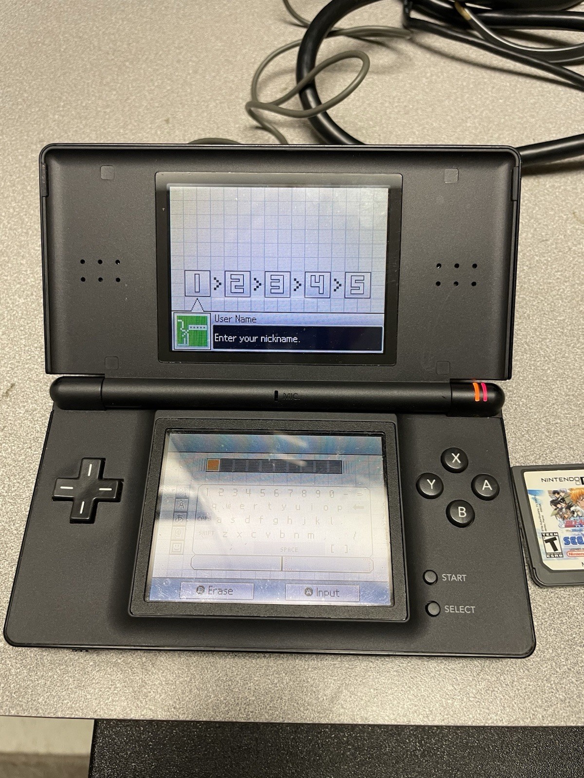 Nintendo DS Lite Black Console USG-001 Bundle w/ Charger, Stylus, Bleach Game