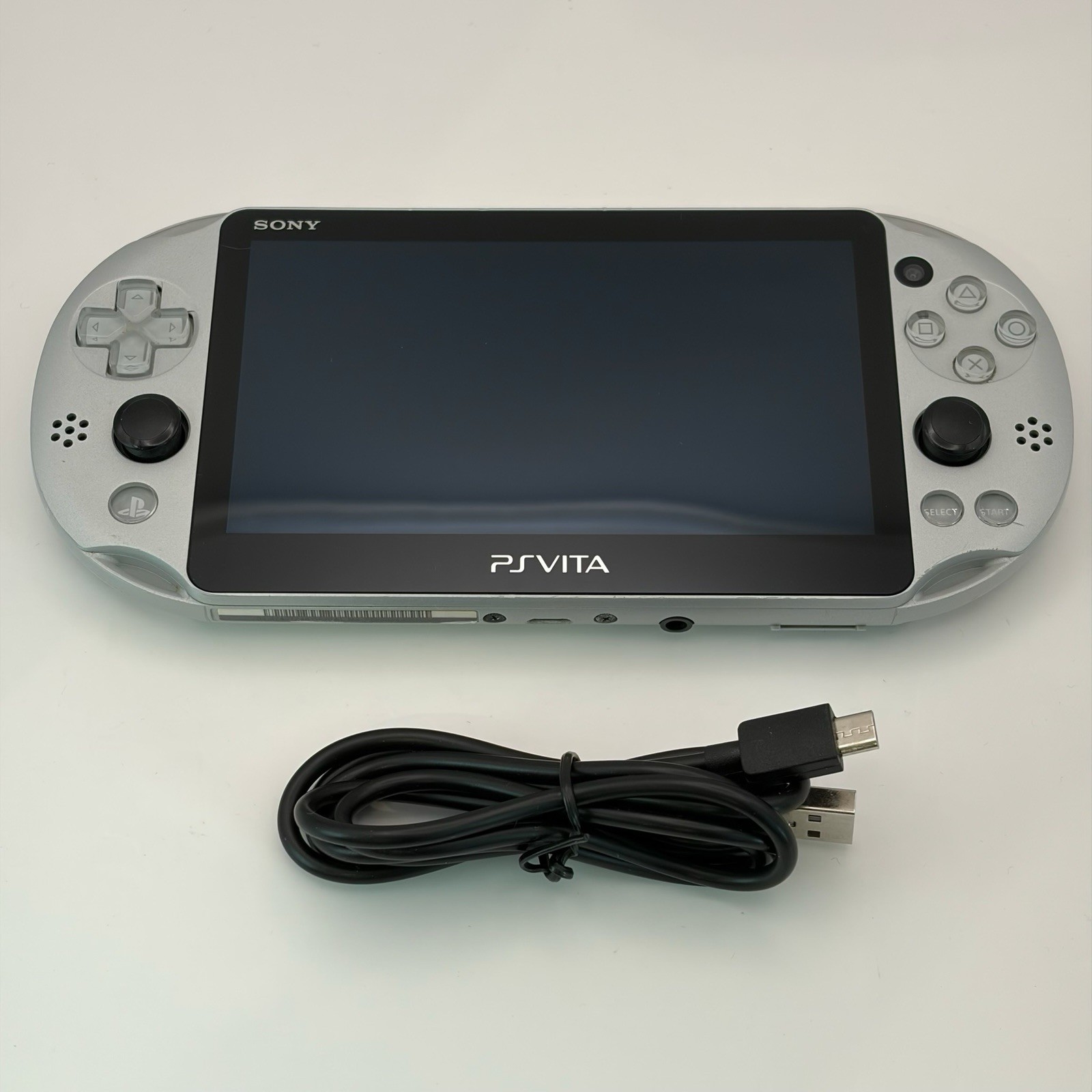 SONY PS Vita PCH-2000 Console Silver Very Good Fast Shipping No joystick drift.