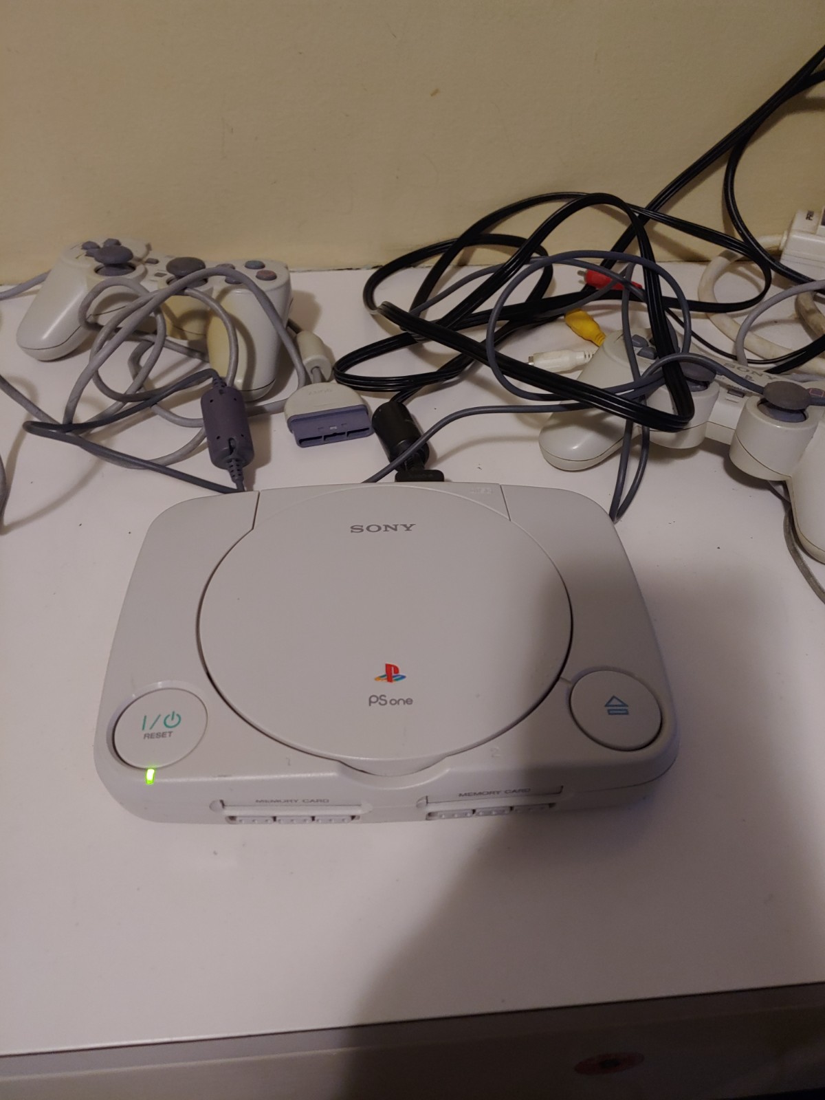 Playstation ONE (PS ONE). used. 2000 small white console version. With 2 analog