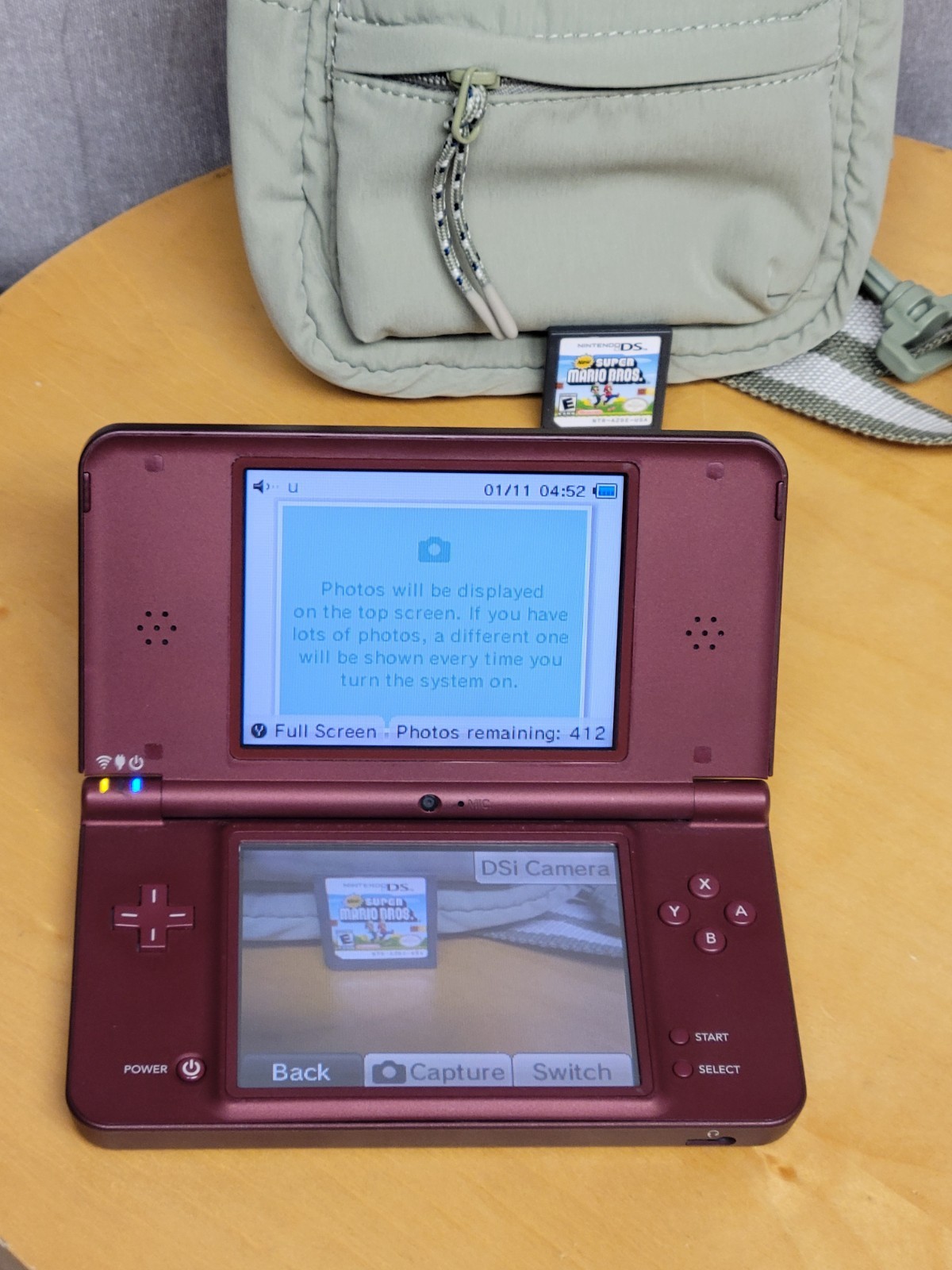 Nintendo DSi XL Handheld System Burgundy W/Mario Game/Home Charger & Case Tested