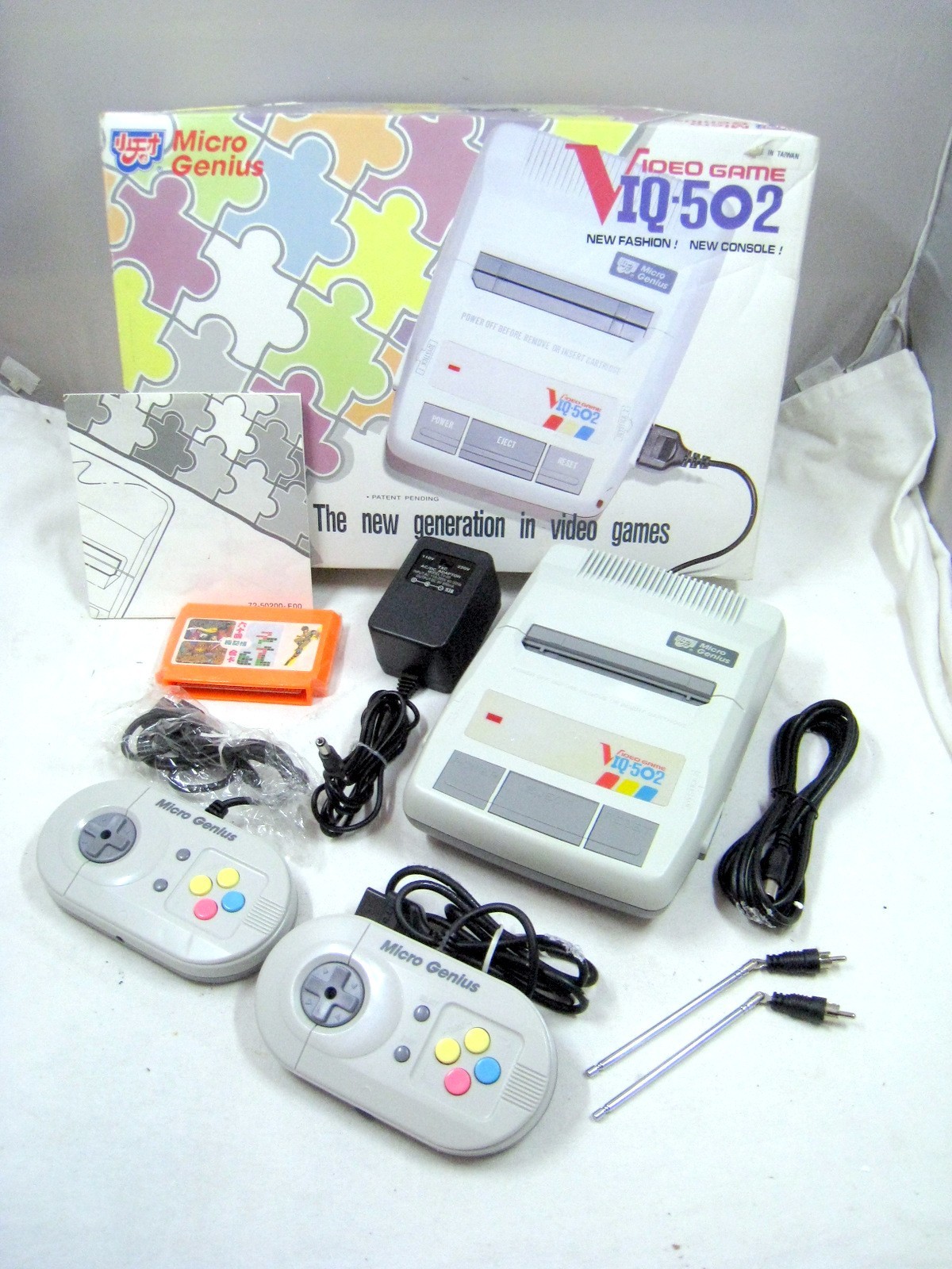Micro Genius IQ-502 Video Game Console with 64-in-1 Video Game Cartridge