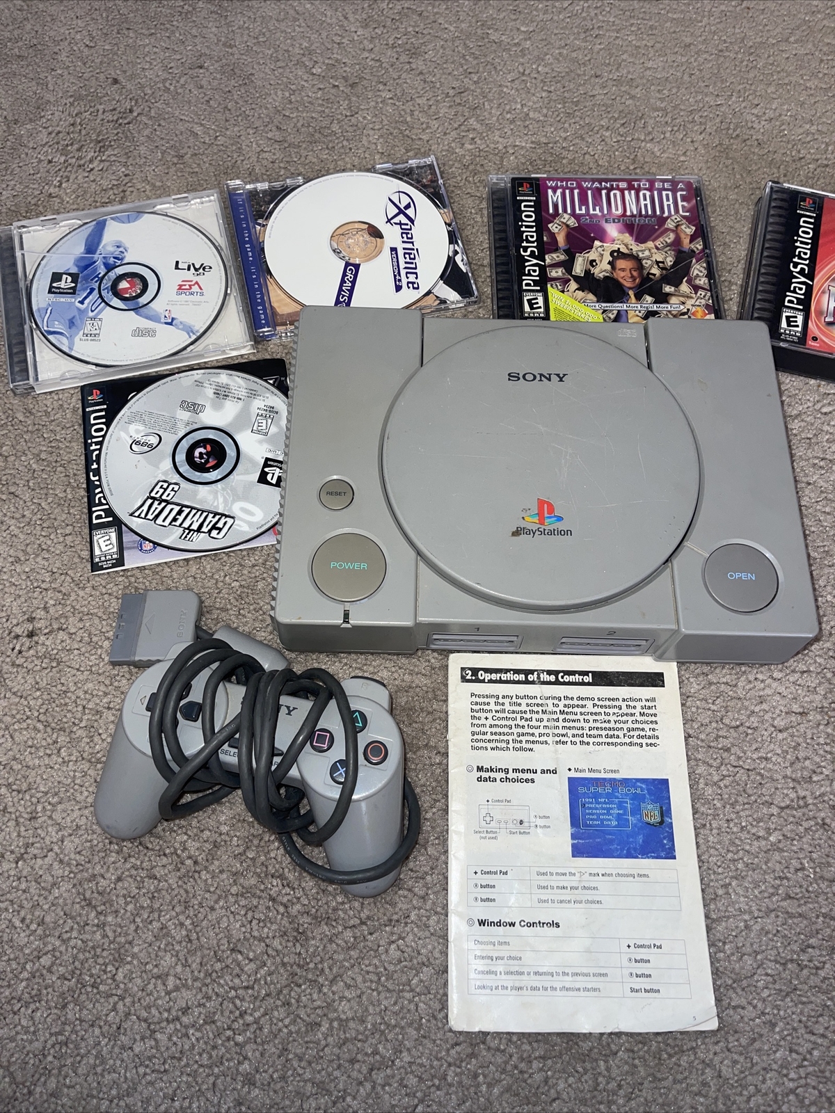 Play Station with games and remote/ no cords to hook up