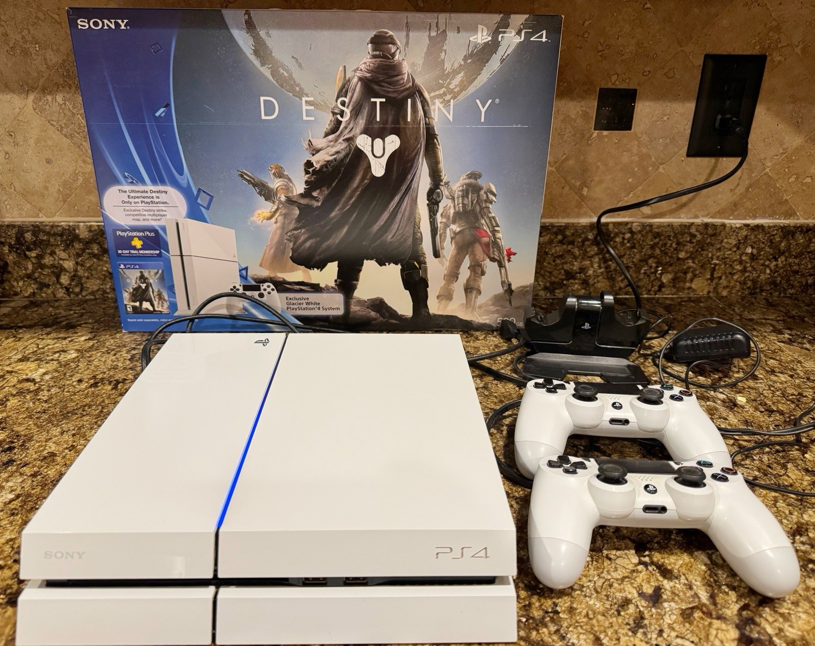 White Sony PlayStation 4 (PS4) w/ (2) DualShock 4 Controllers & Charging Station