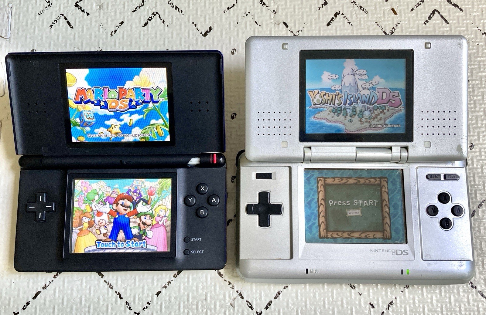 Two Nintendo Consoles – DS Original & DS Lite – WORKING GREAT But Broken Hinges