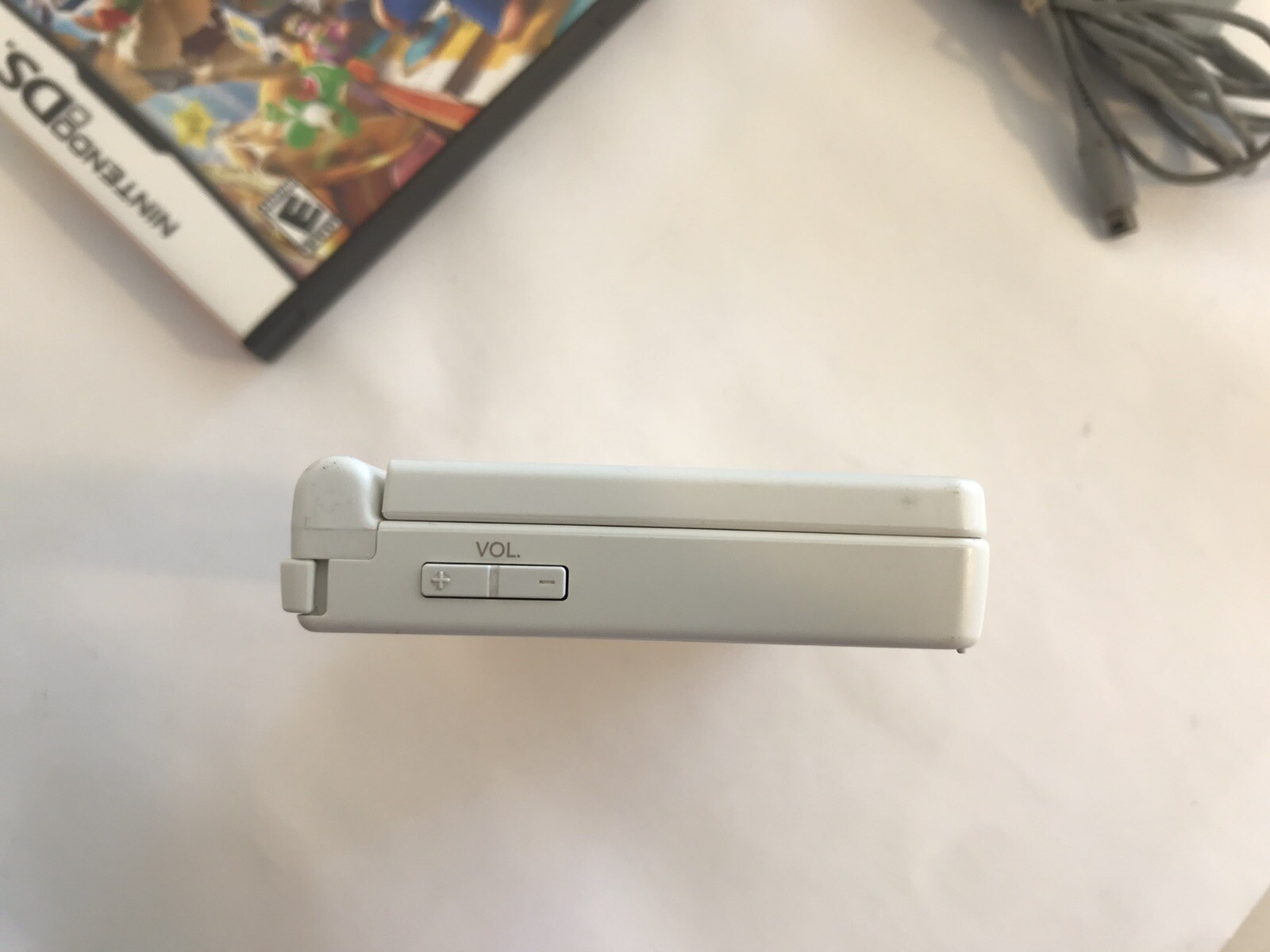 Nintendo DSi Handheld Game Console – White- with charger and 8 games