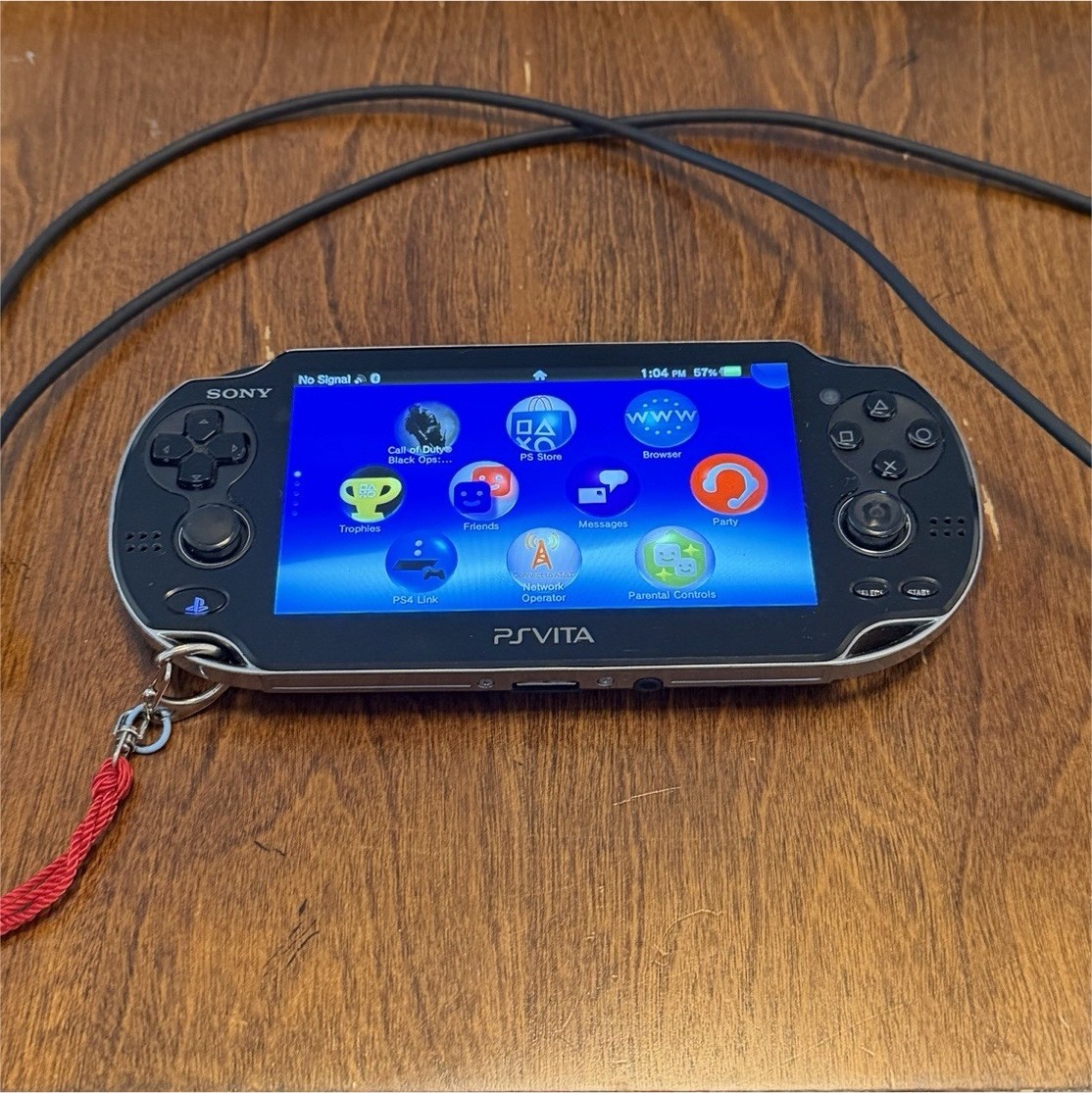 Sony PlayStation Vita PCH-1101 USB Charging Cable and sd2vita. Left stick broken