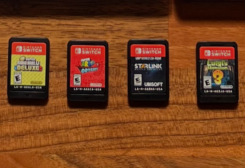 Nintendo Switch OLED 64GB + 15 games + Pro Wireless Controller – Ultimate Bundle