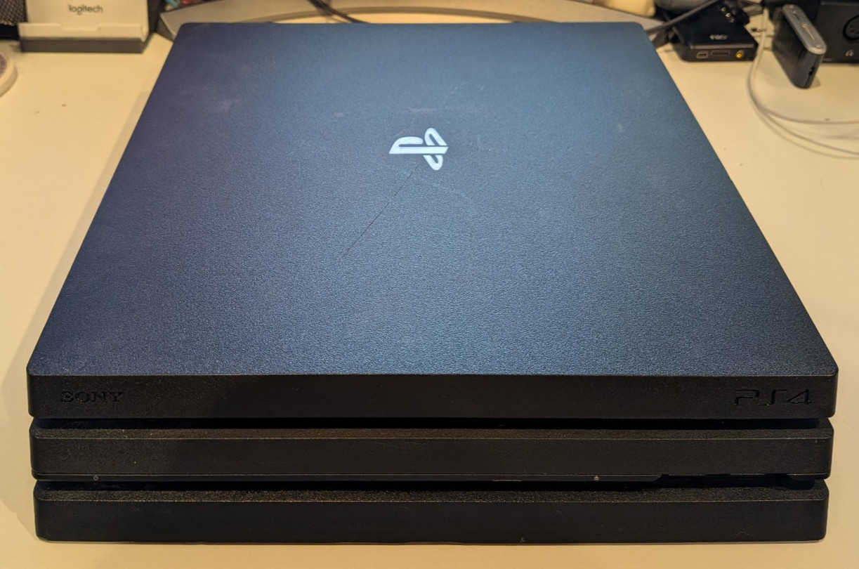 Sony PlayStation 4 Pro – 1TB – Black – With DualShock 4 and Cables – No Games