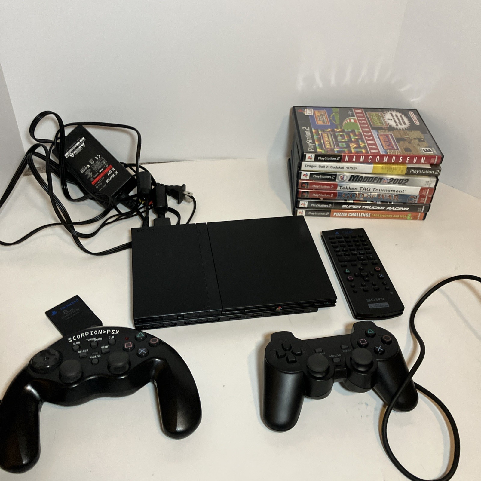 Sony PlayStation Slim 2 Controllers 1 Remote + Cables 7 Games (1)