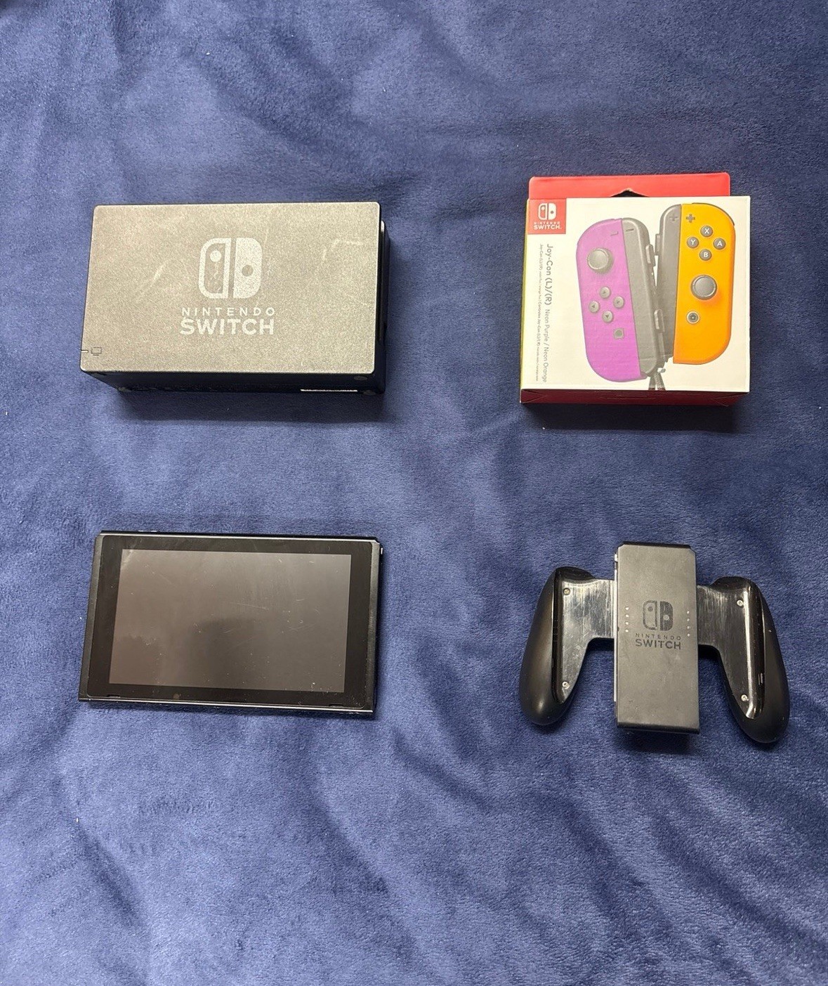 Nintendo Switch Console w/ Dock, Grip & Unopened Neon Purple/Orange Joy-Cons