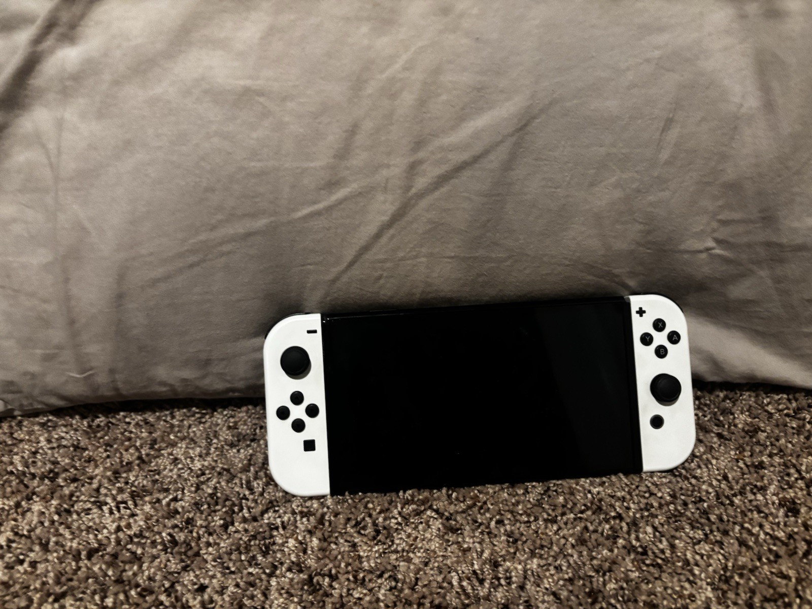 Nintendo Switch OLED with Joy-Cons, joycon grip, grip cable, dock, and charger