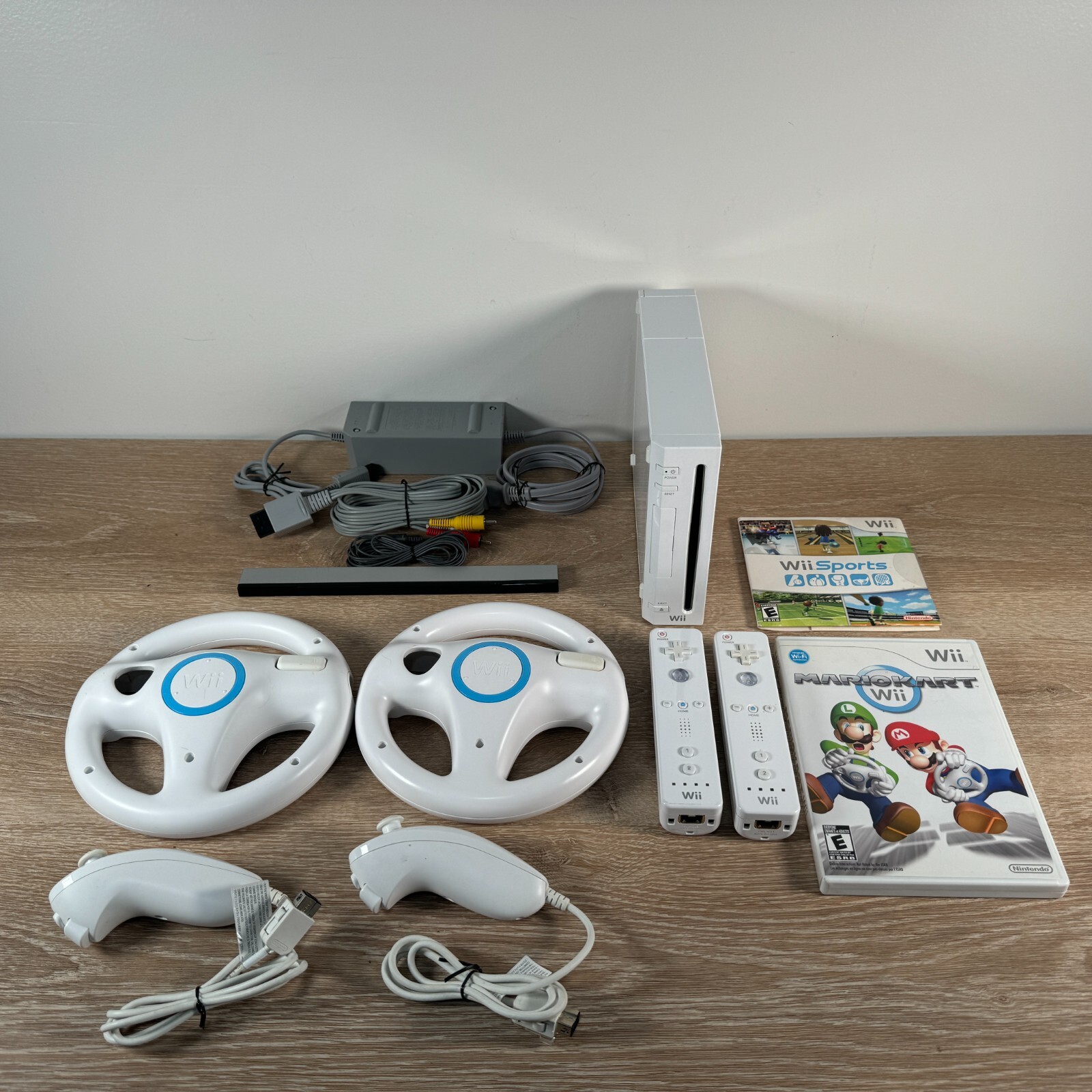 Nintendo Wii Console Mario Kart Bundle with Wii Sports, 2 Controllers & 2 Wheels