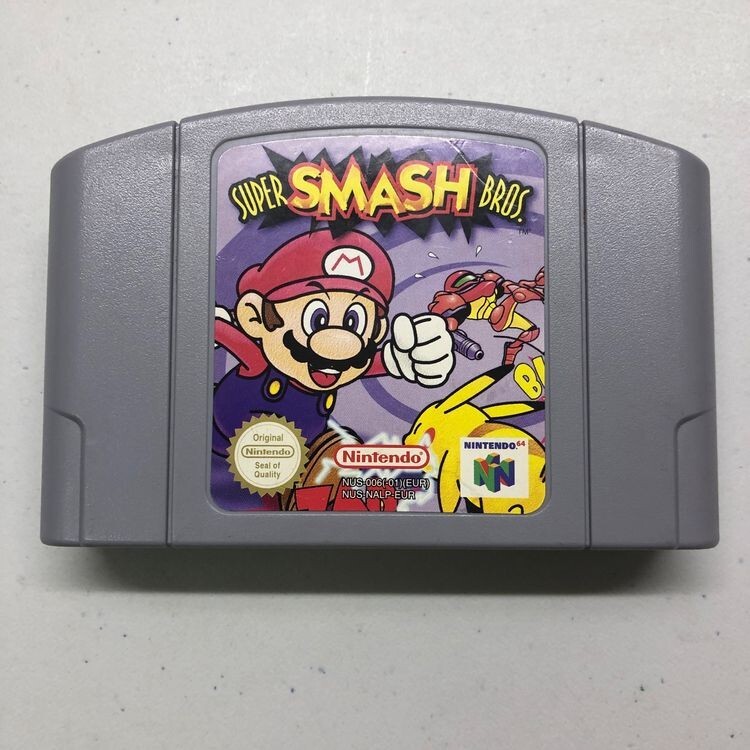 Nintendo 64 console: 1 Remote, Super Smash bros, Starfox64, and Mario Kart 64