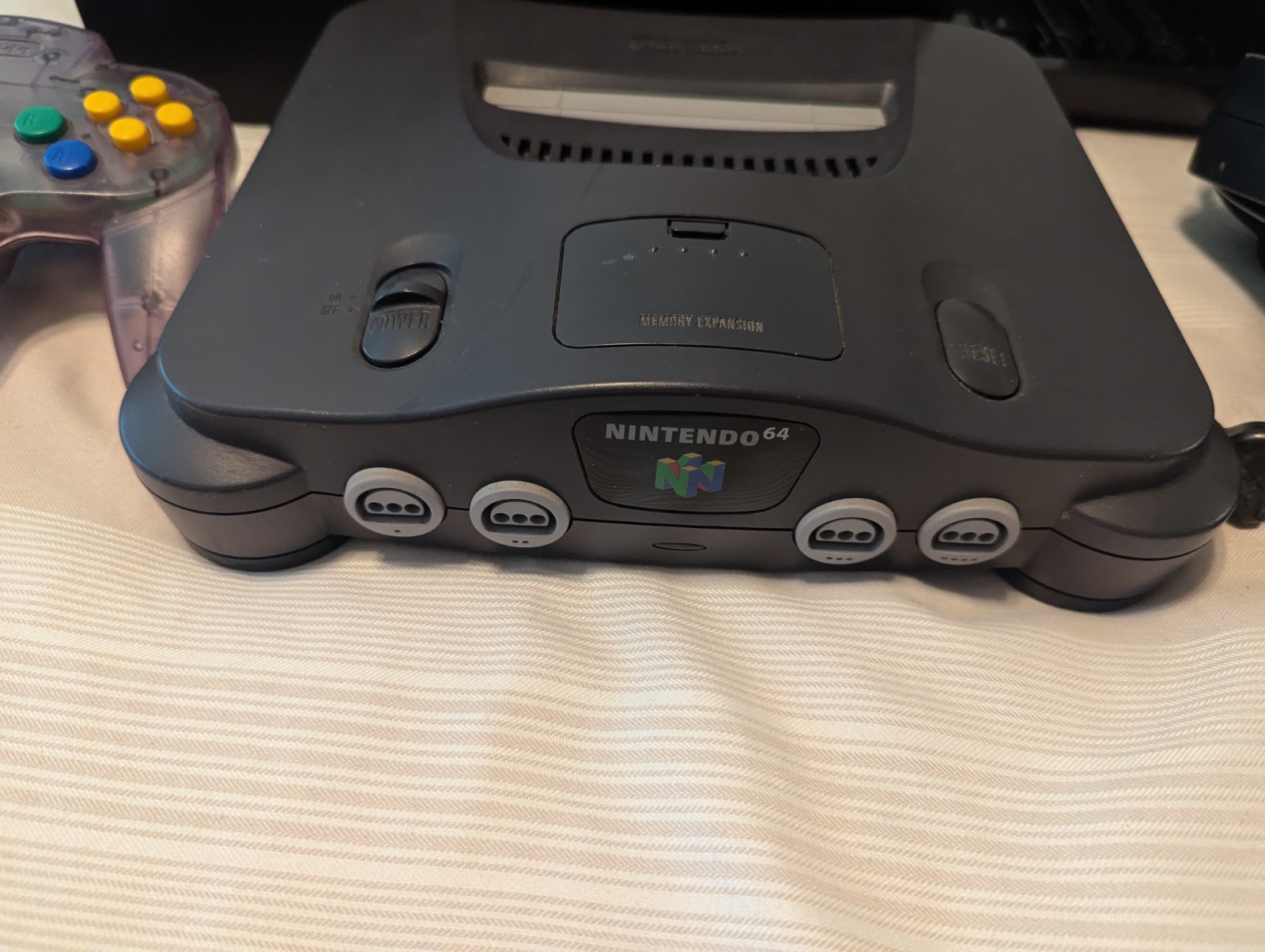 Nintendo 64 black.Purple Translucent Controller And 2 Games and case