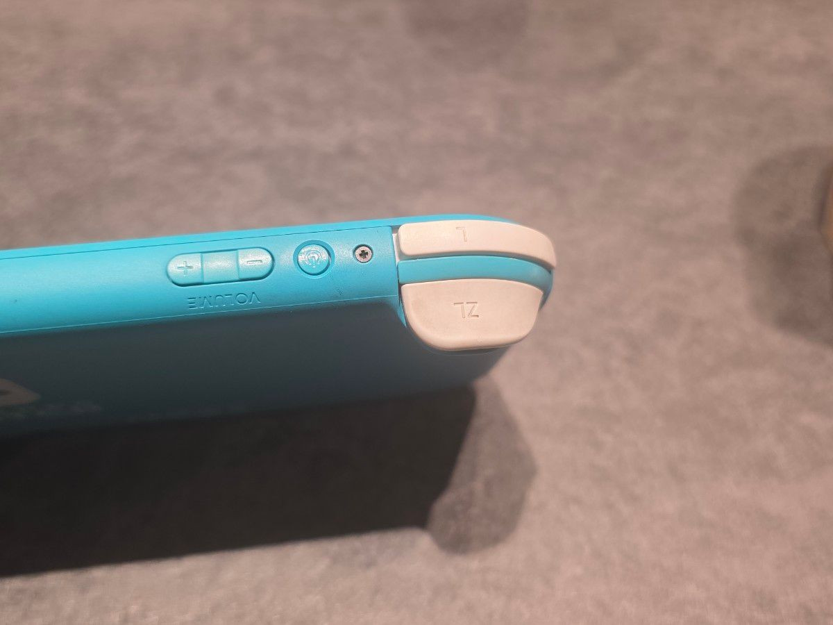 Nintendo Switch Lite Turquoise Handheld Console (Japanese Version)