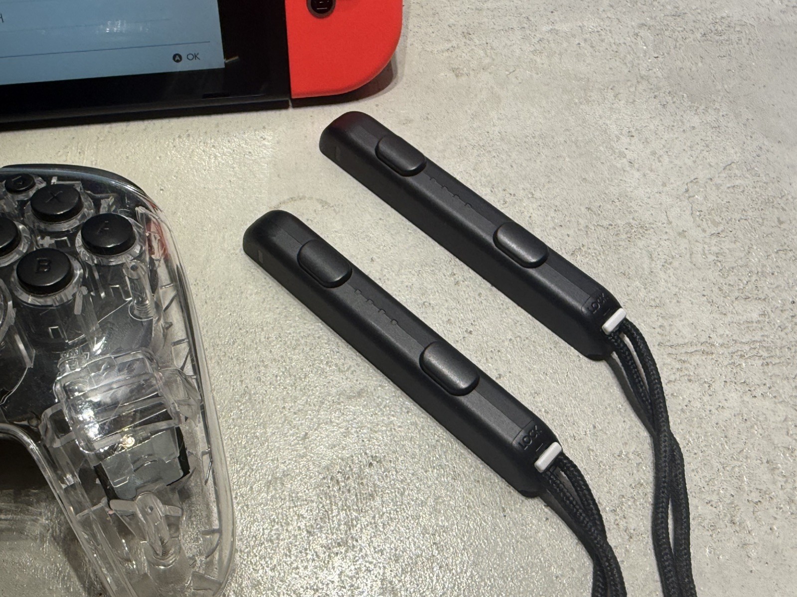 Nintendo Switch with two RGB controllers and docking station dock