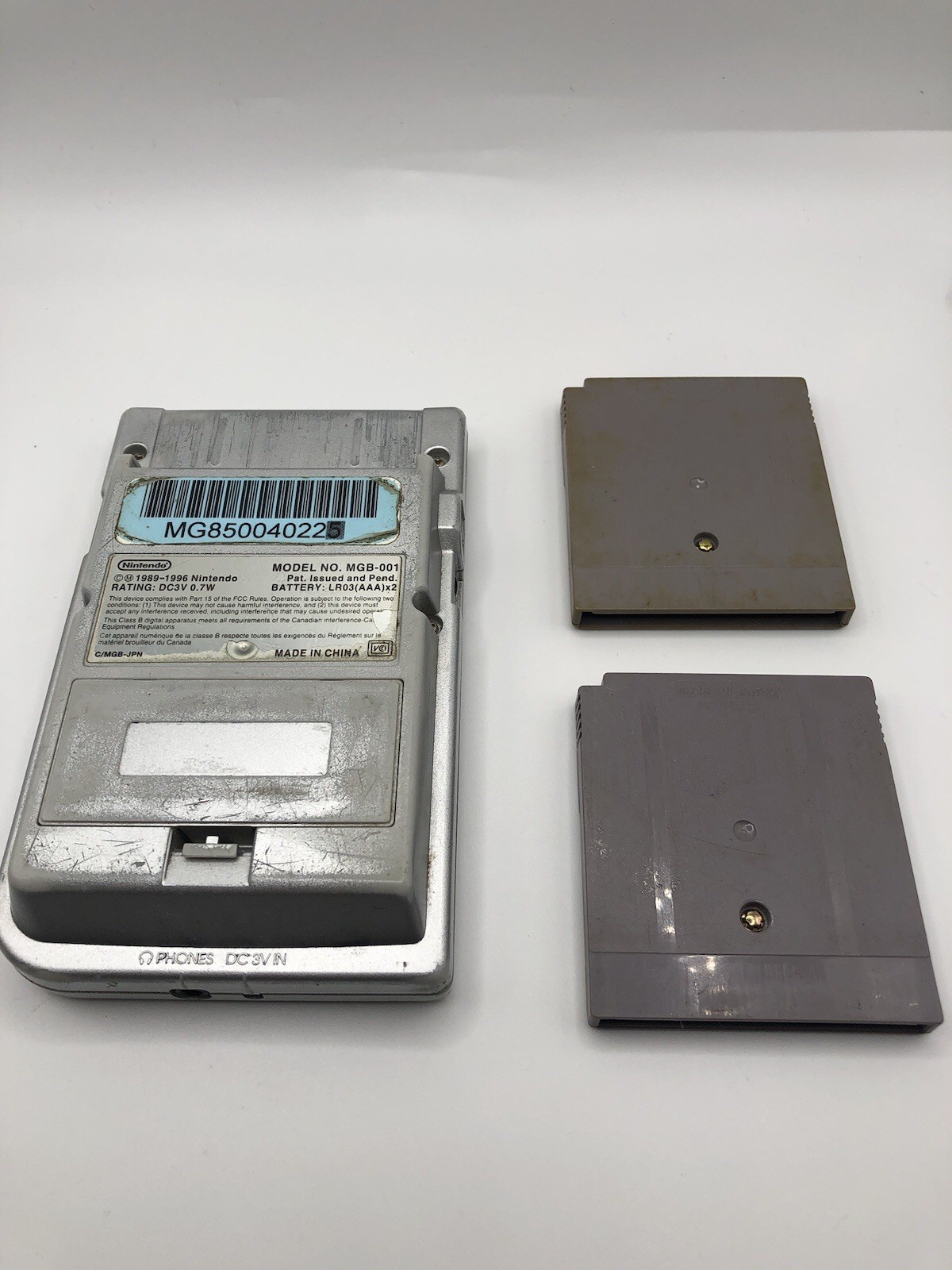 Silver Game Boy Pocket W/ Wall Charger, Animaniacs And Jurassic Park, Great Cond