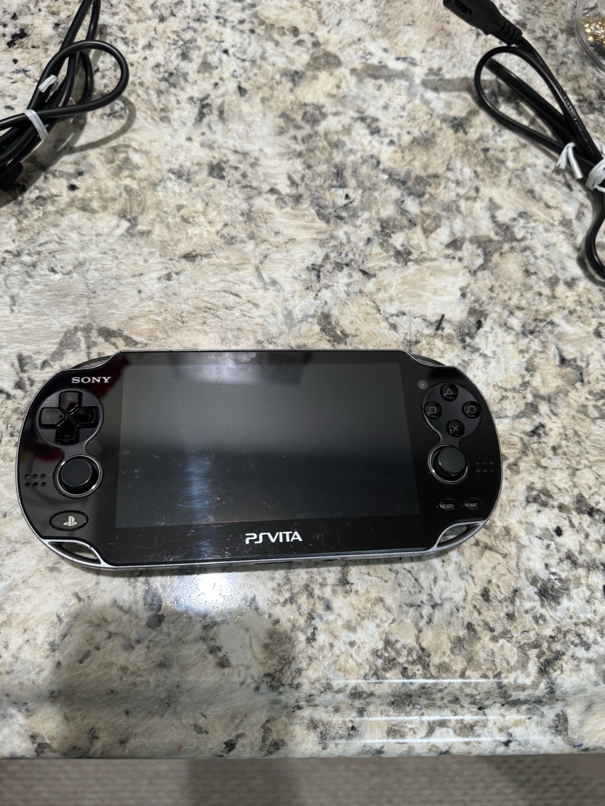 Sony PlayStation Vita – Model PCH-1101 – Black with Charger and 4GB Memory Card