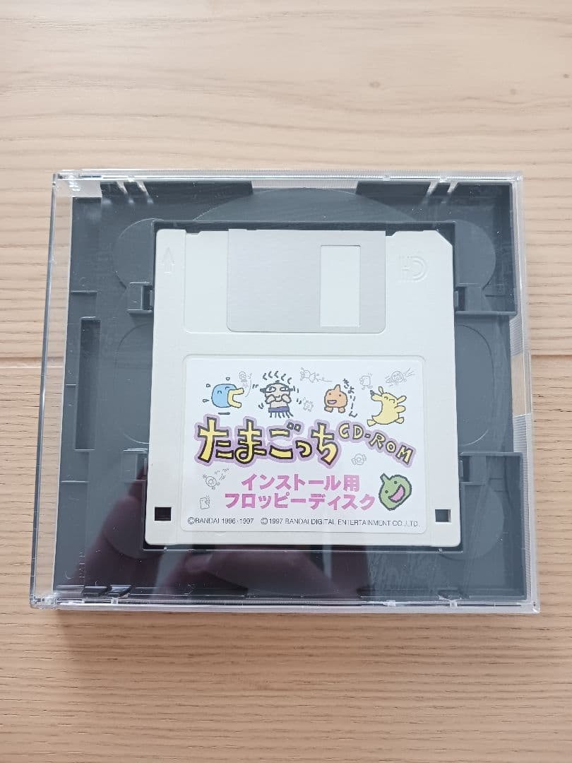 Retro Windows 95 Tamagotchi CD-ROM with Sticker – Rare PC Game
