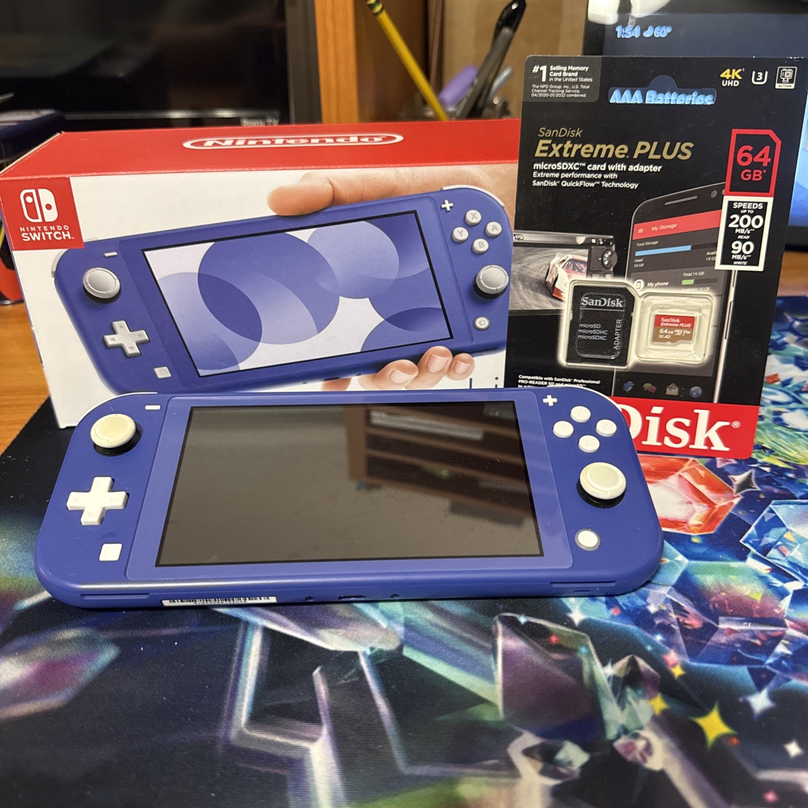 Nintendo Switch Lite Blue Working with Box and 64gb Micro SD No Charger