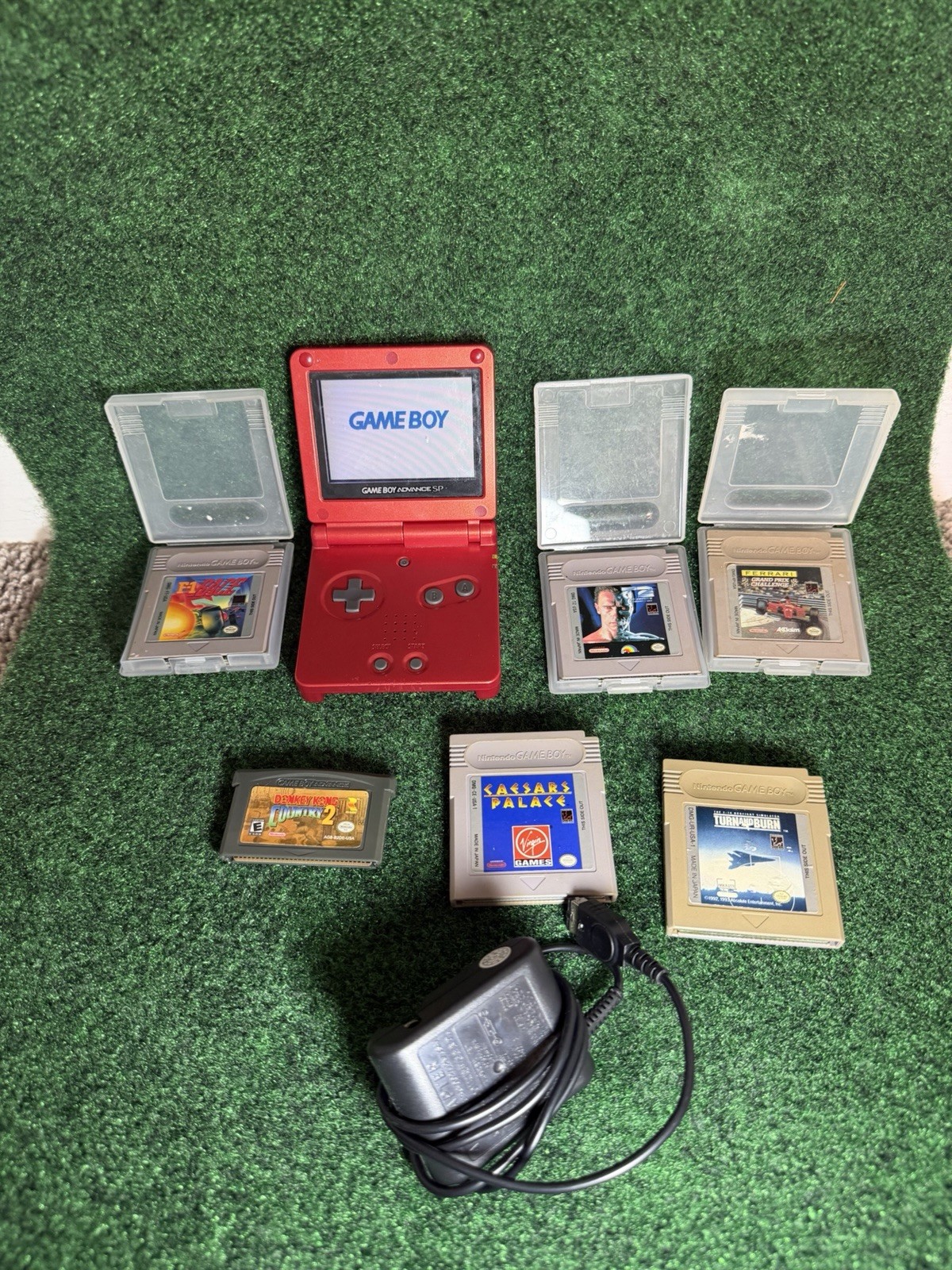 Nintendo Game Boy Advance SP Handheld System – Flame Red with Games and charger