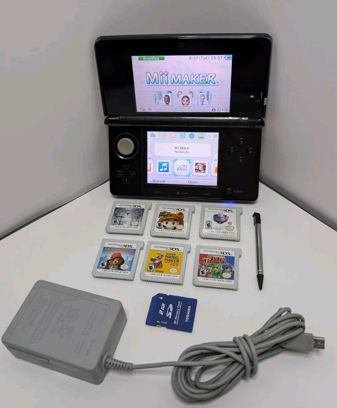 Nintendo 3DS Cosmo Black CTR-001 USA – 3DS Bundle 6 Games Mario Zelda Spider-man