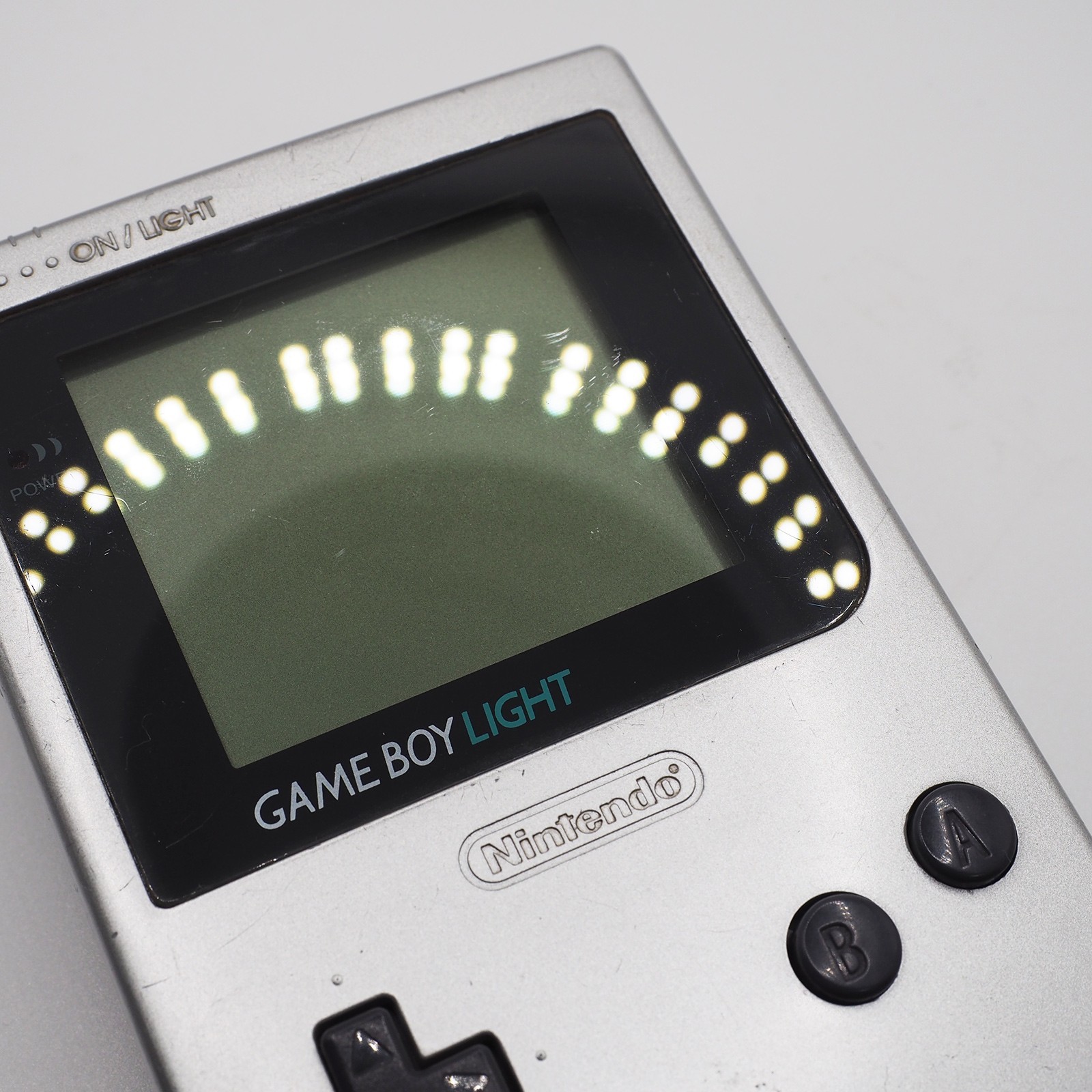 Nintendo Game Boy Light SILVER console MGB-101 WORKING CLEANED #0141_32[VG]