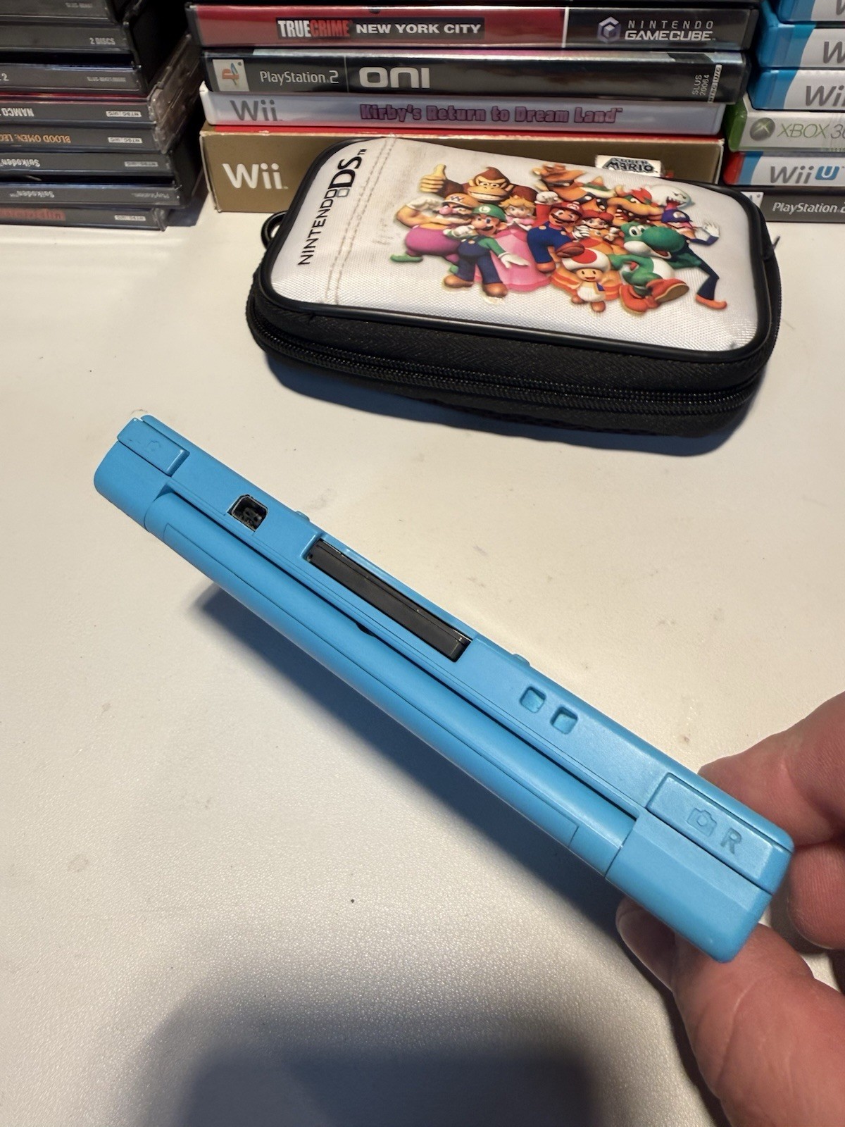 Nintendo DSi Aqua Blue Handheld Console Stylus Charger Monkeyball Tested Works