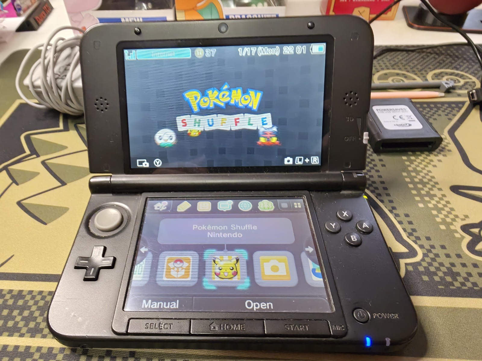 Nintendo 3DS XL Blue/Red With Multiple Pokemon Games.