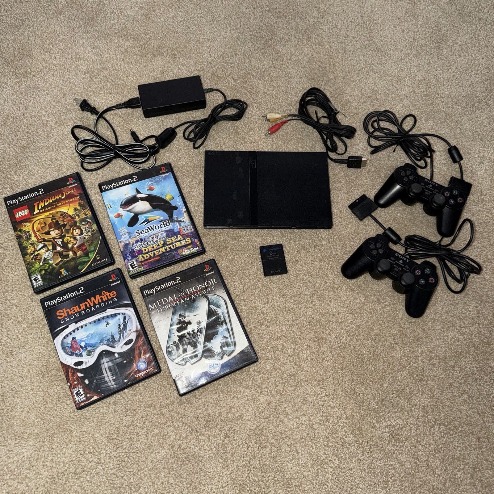 Sony PlayStation 2 Slim w/ Controllers, Games, and Cables [TESTED/WORKS]