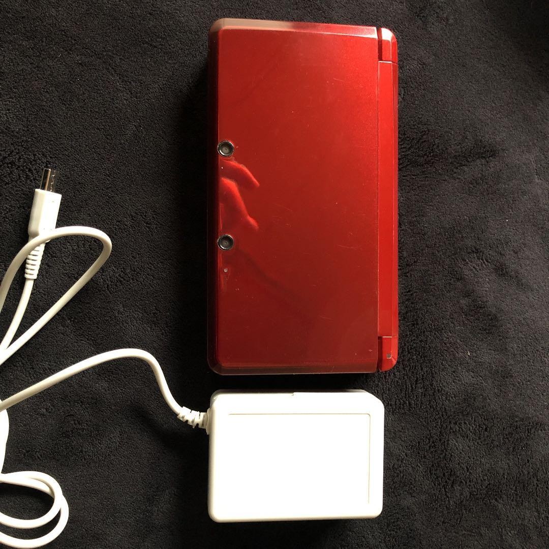 Nintendo 3DS wine red with charger touch pen comes with Monster Hunter 3 softwa