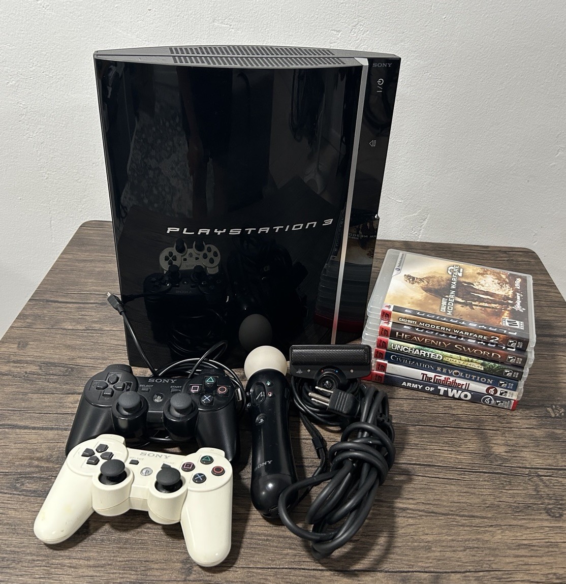Sony PlayStation 3 CECH-H01 40GB with 6 Games, PlayStation Move & 2 Controllers