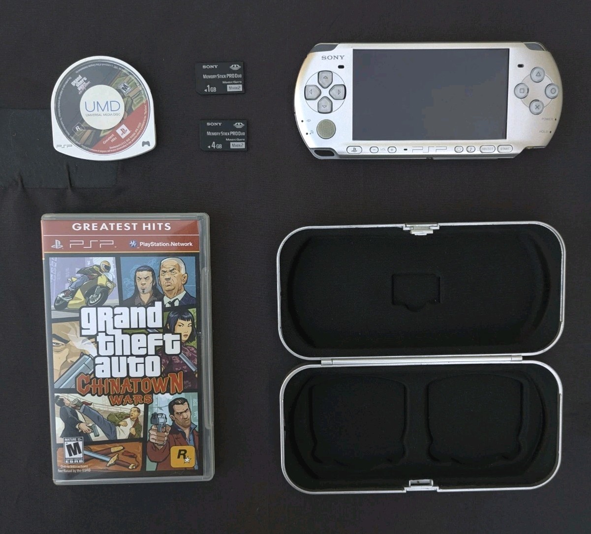 Sony PSP 2000 Handheld Console Silver with 2 Games Case Charger Lot