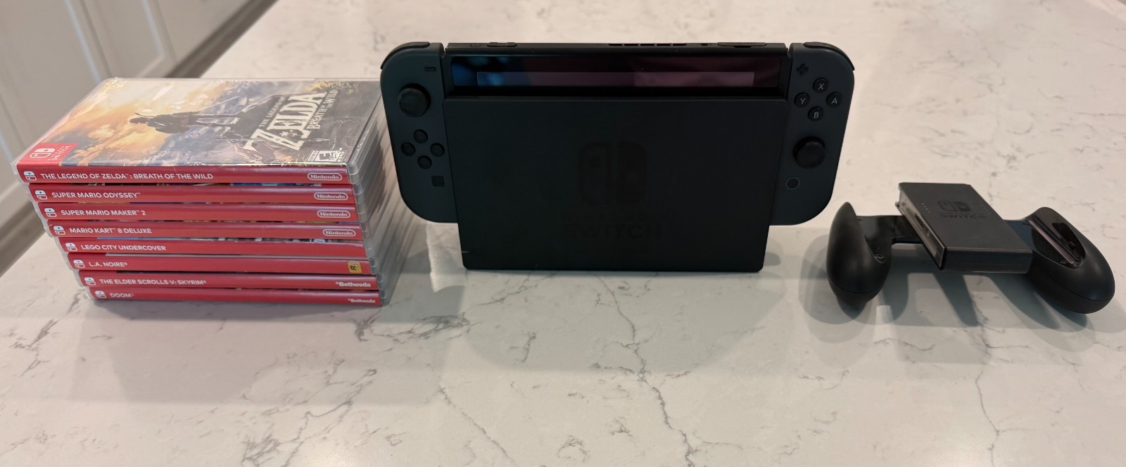 Nintendo Switch – Gray Joycons, 8 Game Lot, 128 GB Micro SD Card