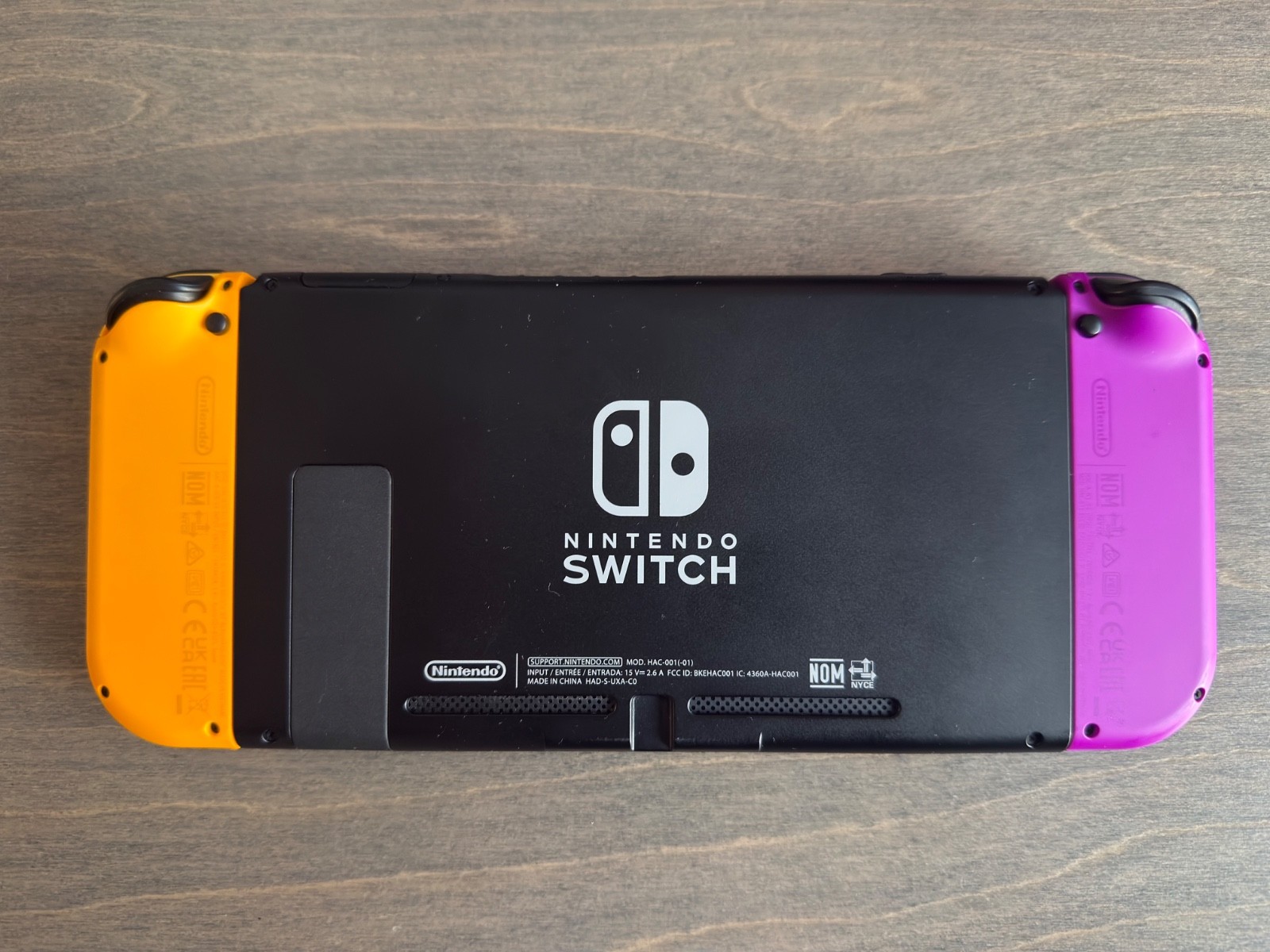 Nintendo Switch Console with Yellow and Purple Joy-Con and accessories BUNDLE