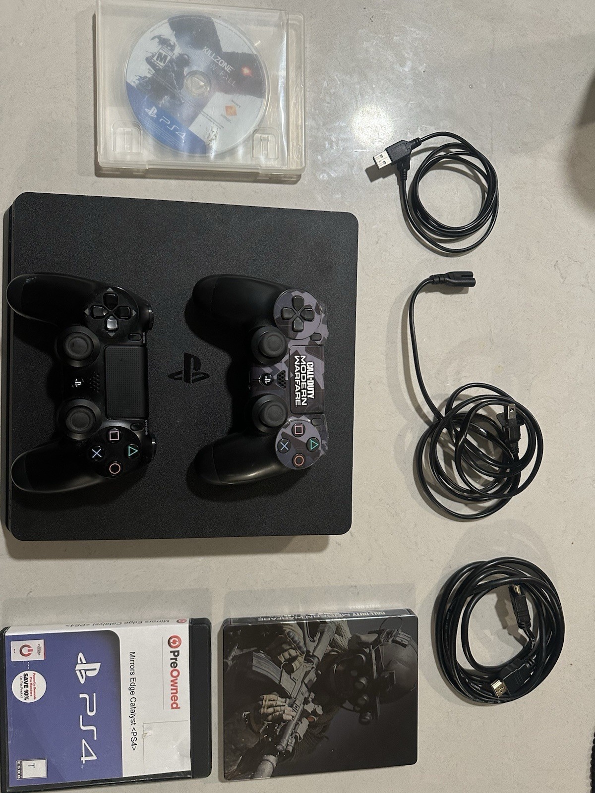 PlayStation 4 Slim 1TB Black Console Modern Warfare bundle with 2 Controllers