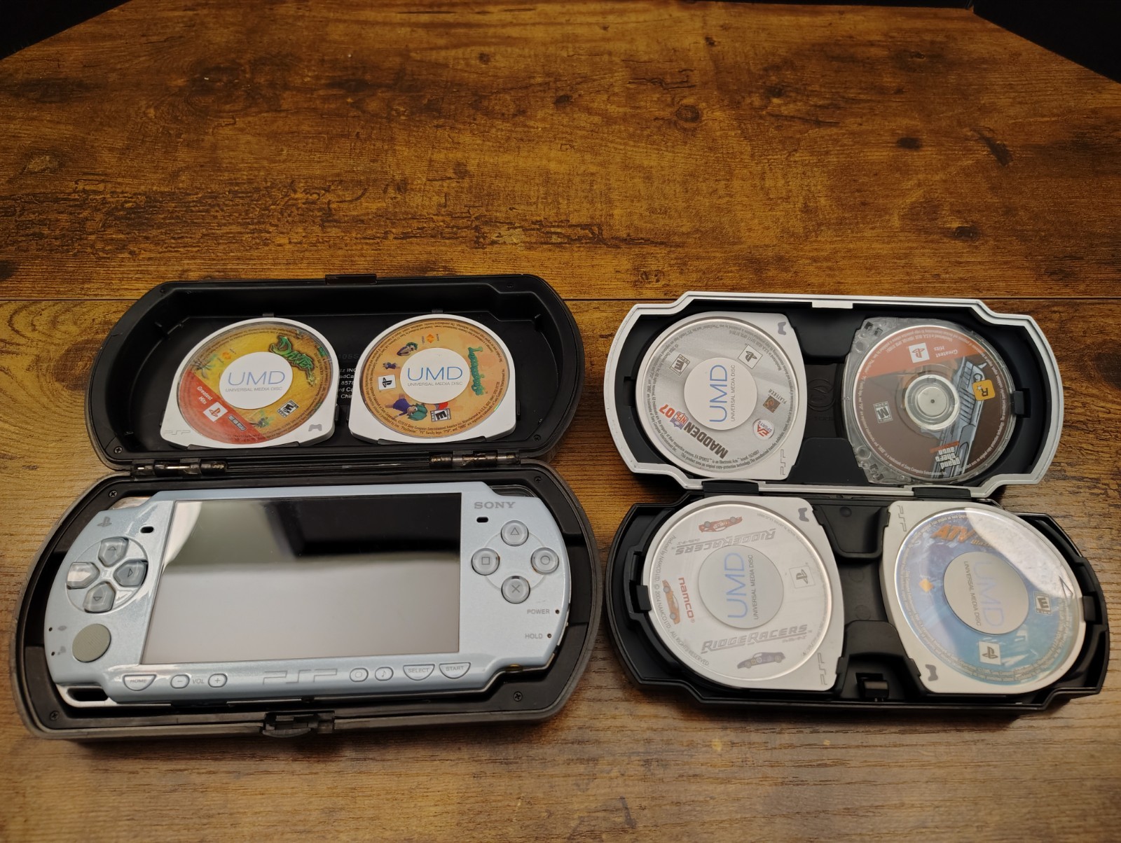 SILVER Sony PSP 2000 System Bundle With Games, Movies, And Cases