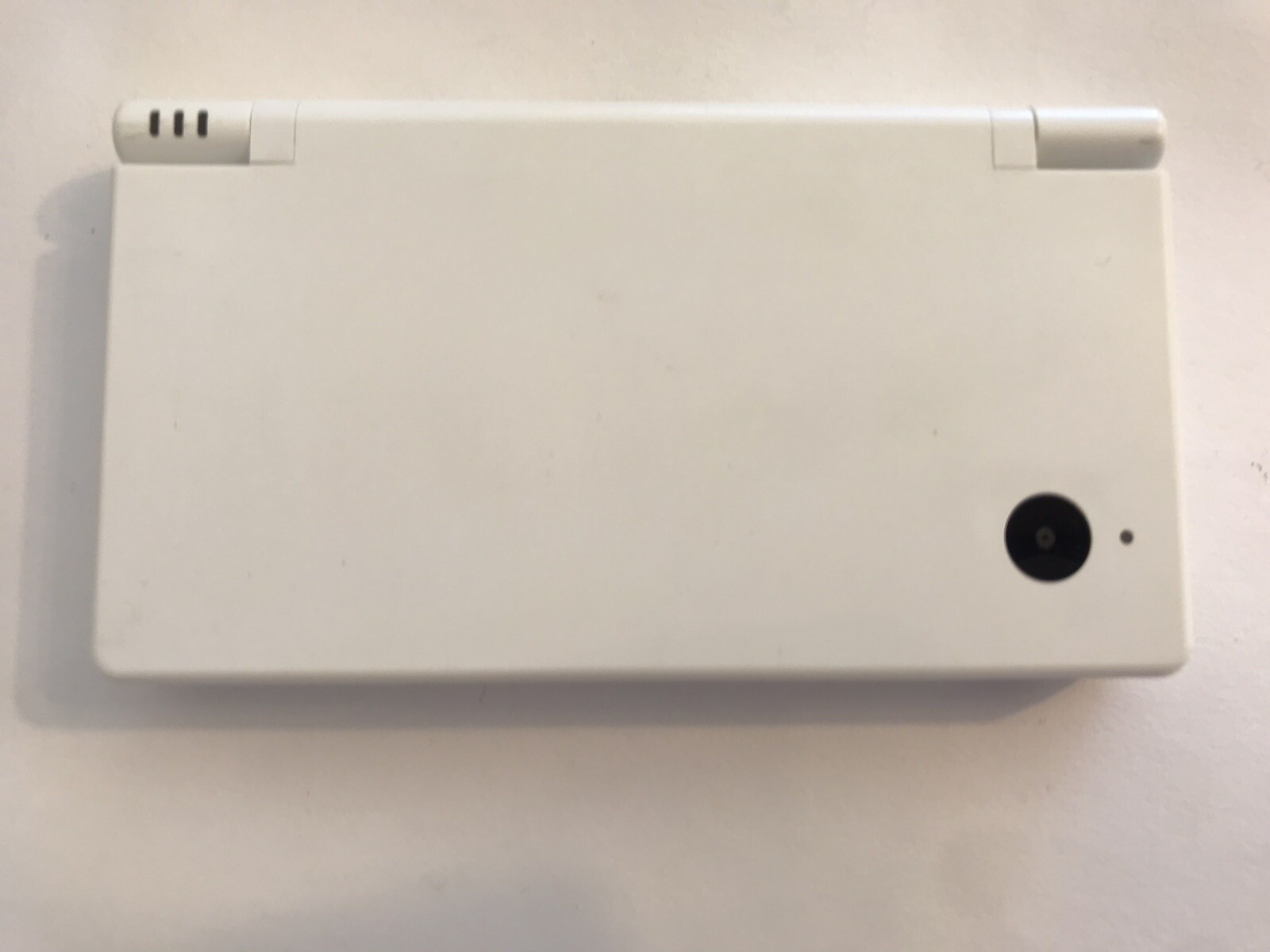 Nintendo DSi Handheld Game Console – White- with charger and 8 games
