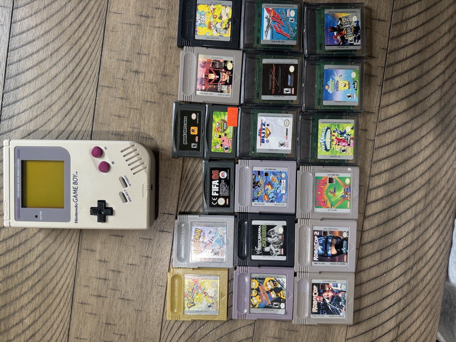 Gameboy With Pokemon Gold And Silver
