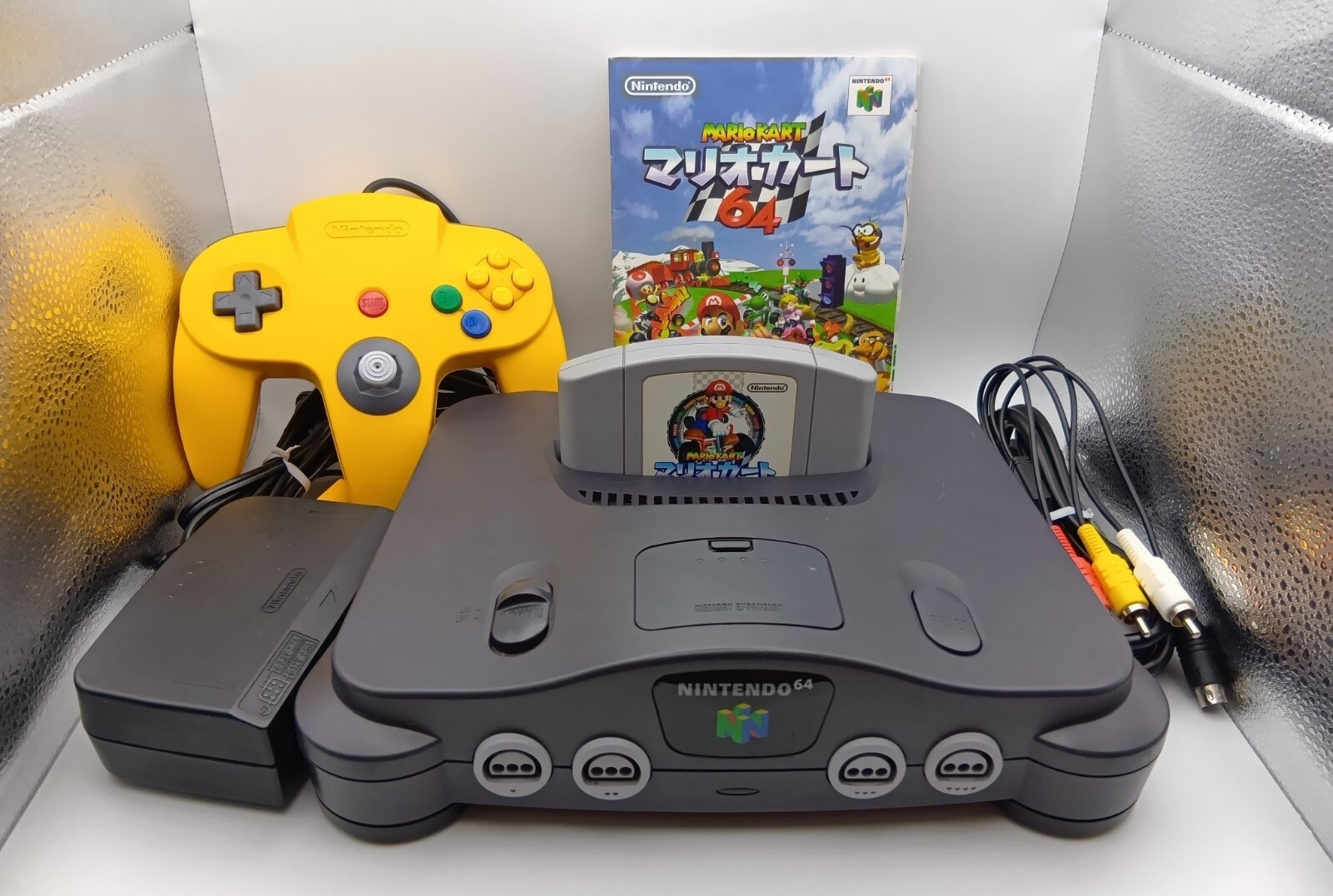 Nintendo 64 console, yellow controller, power cable, adapter, Mario Kart tested