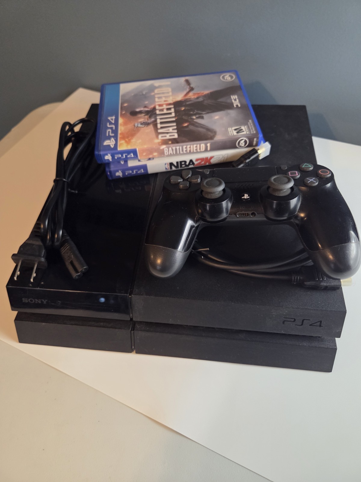 Sony PS4 500GB Console Bundle + DualShock 4 + Battlefield 1 & NBA 2K21 – Tested