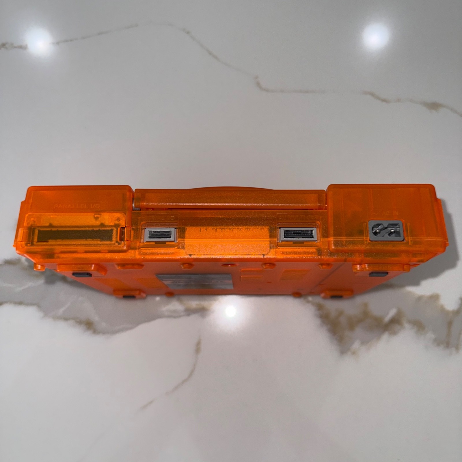 Sony PlayStation 1 Console (SCPH-5501) Bundle – Transparent Orange Clear Shell