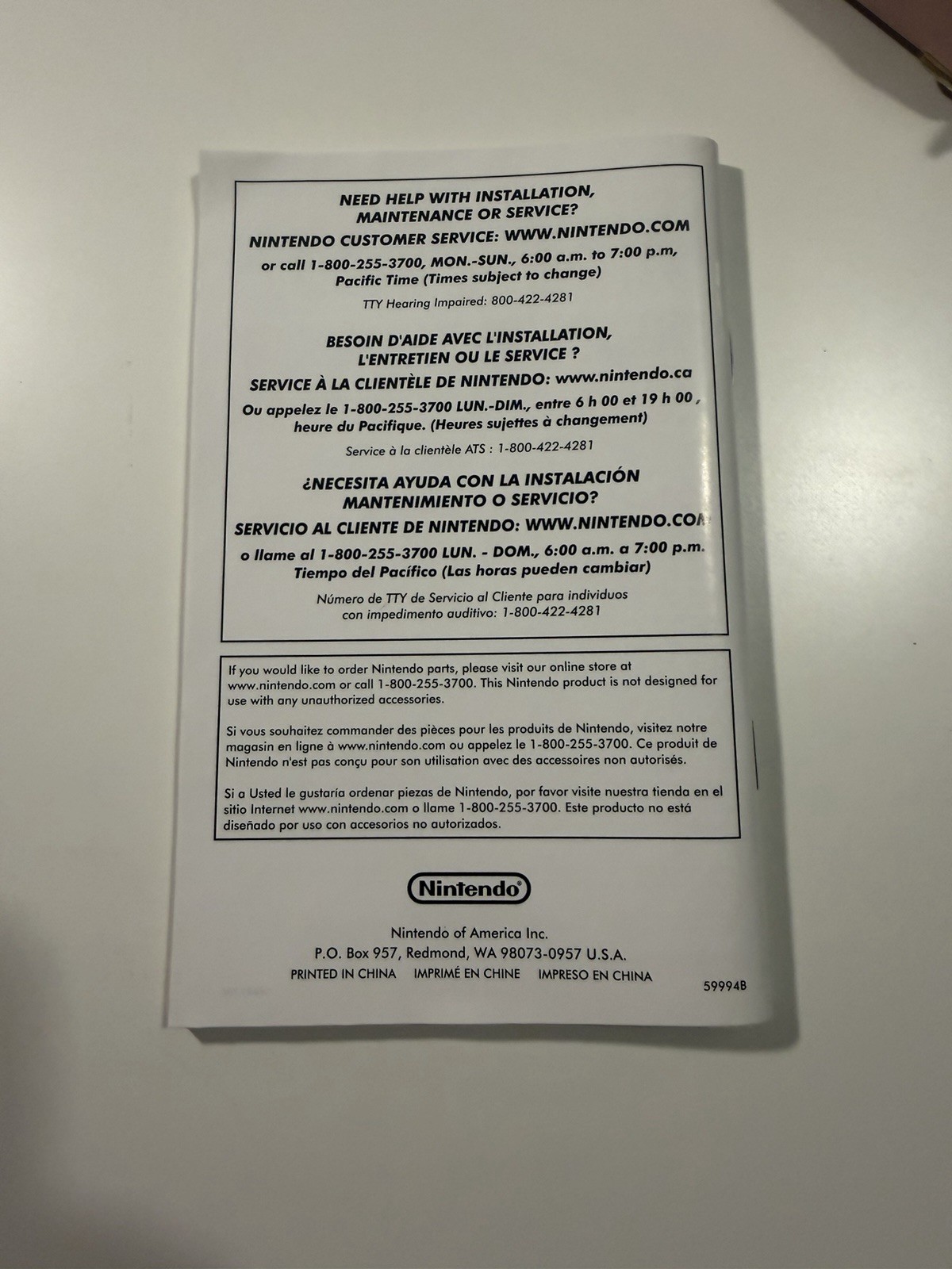 Nintendo DS Lite Metallic Rose System With Charger, Original Box, And 2 Cases