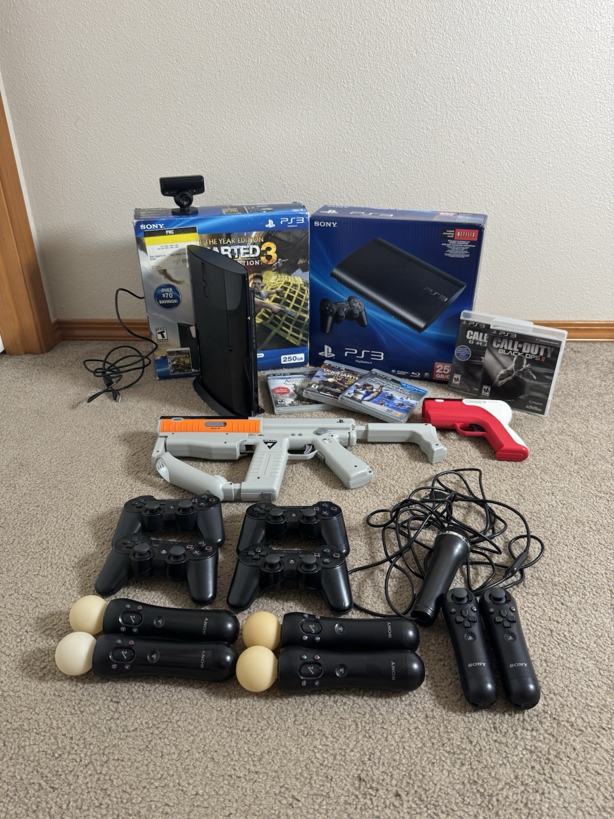 Ultimate PS3 Super Slim 1 TB SSD Bundle 4 Controllers, 4 PS Moves, Karaoke